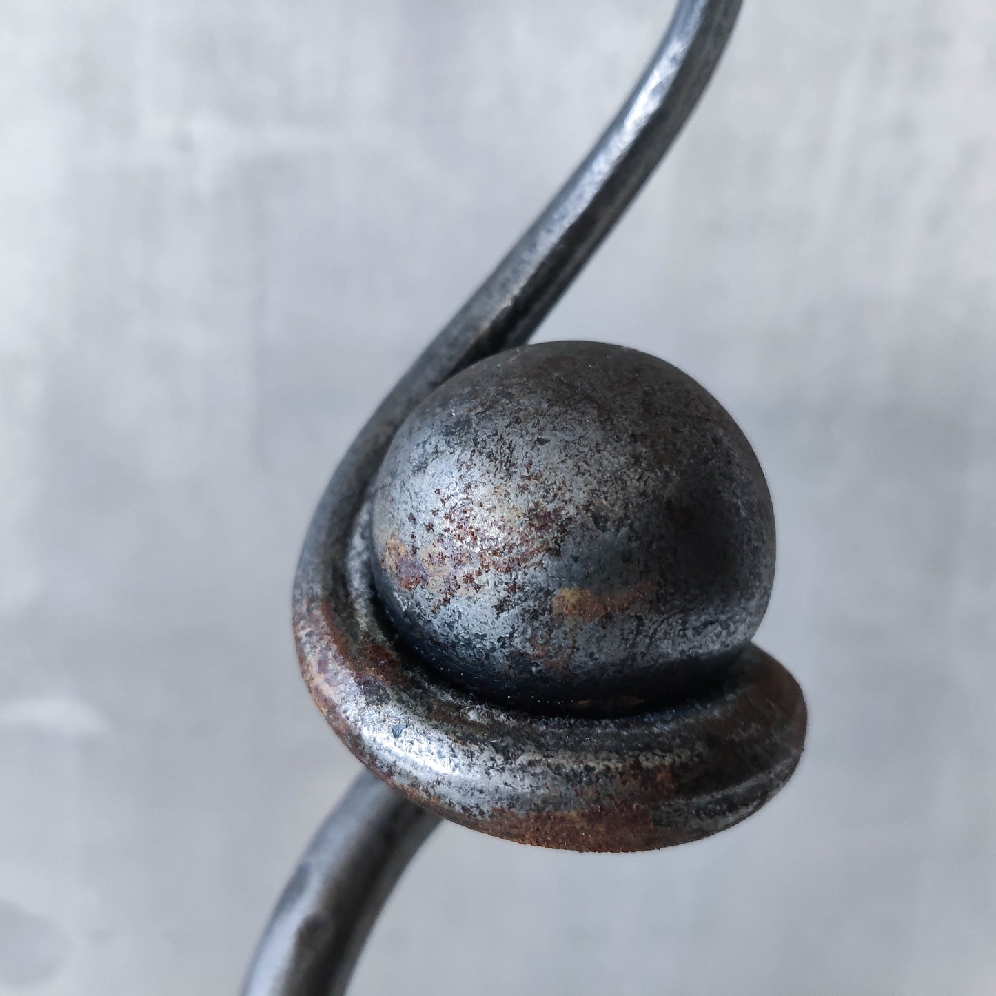 Trio of sculptural handmade wrought iron welded steel candle holders with steel balls