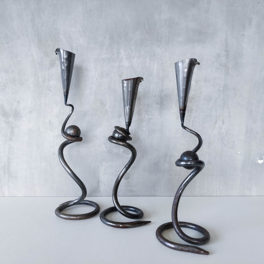 Trio of sculptural handmade wrought iron welded steel candle holders with steel balls