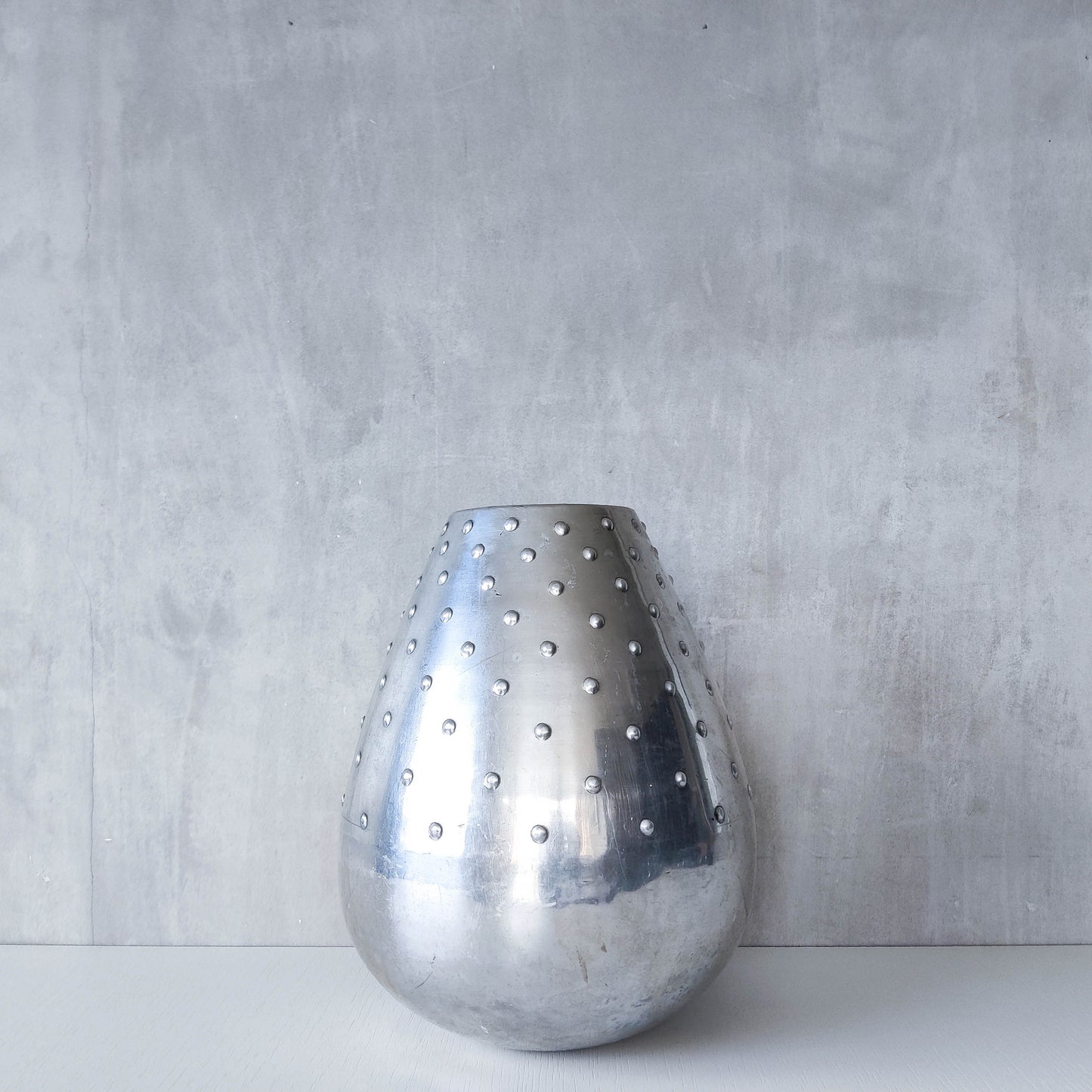 Large vintage 1990s silver pressed metal hobnail studded dimple vase Leon Fontier style