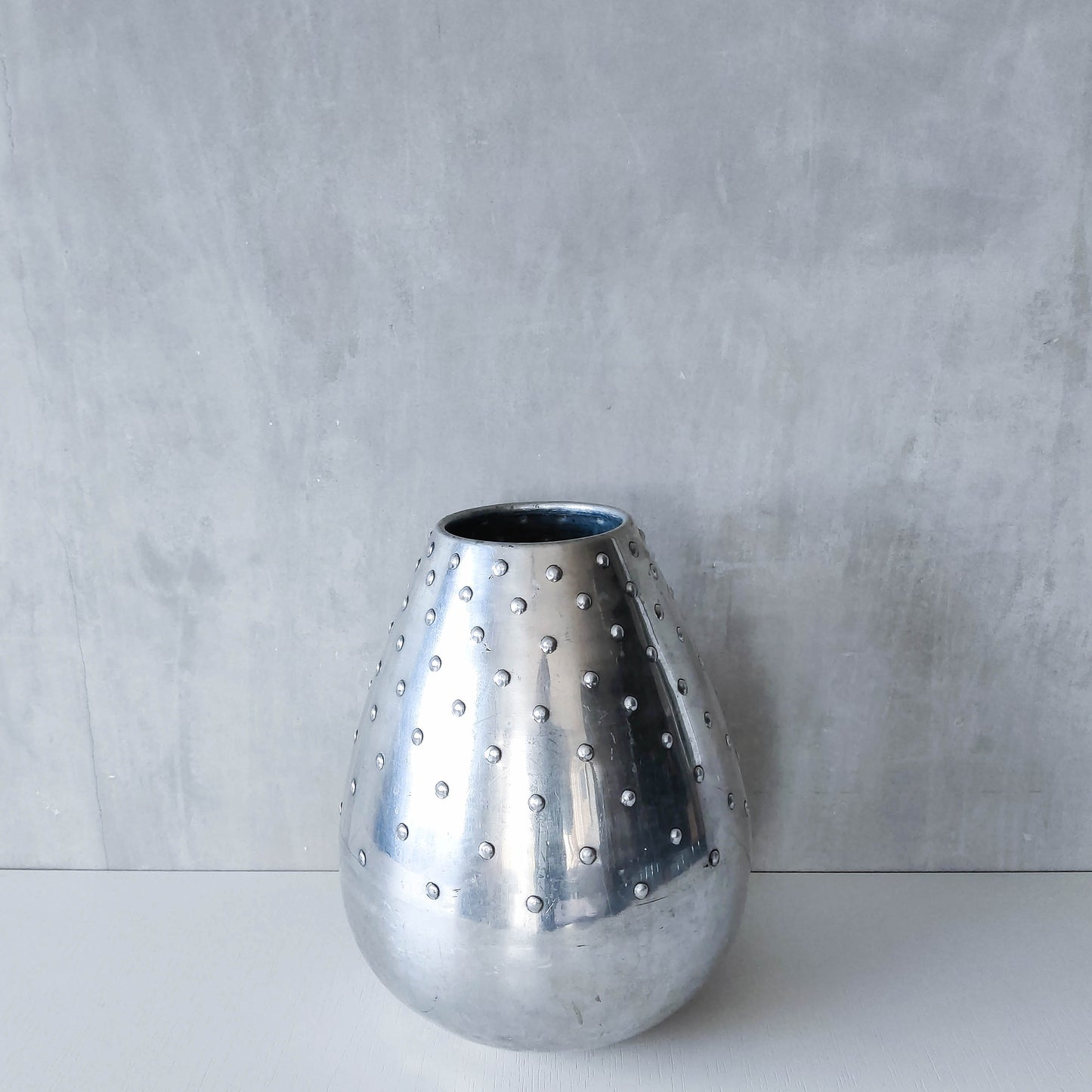 Large vintage 1990s silver pressed metal hobnail studded dimple vase Leon Fontier style