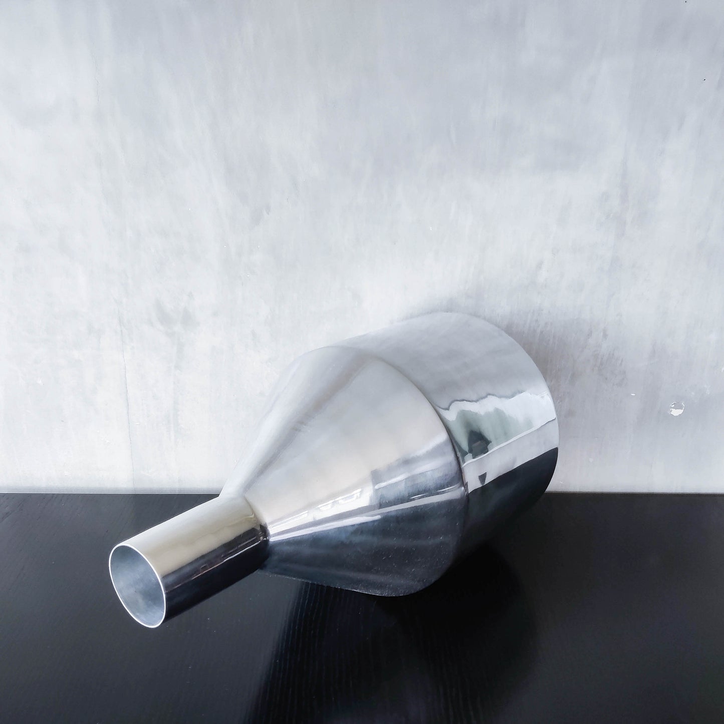 Large cast aluminium sculptural funnel shaped vase