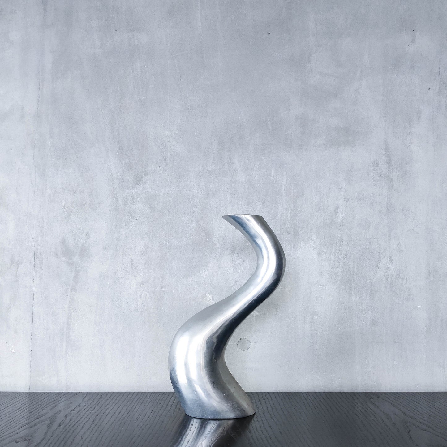 Vintage 1990s hand cast aluminium wavy sculptural S vase