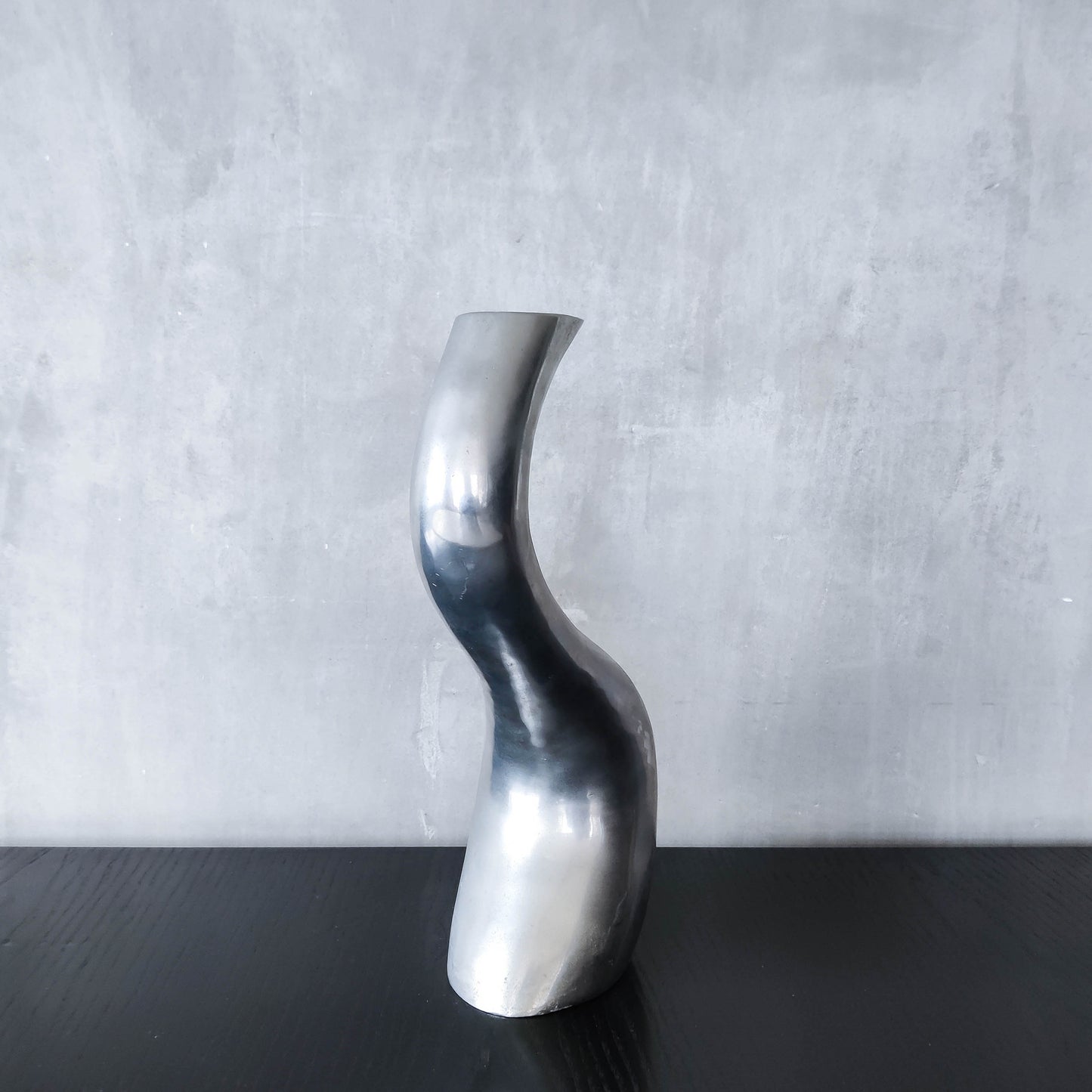 Vintage 1990s hand cast aluminium wavy sculptural S vase