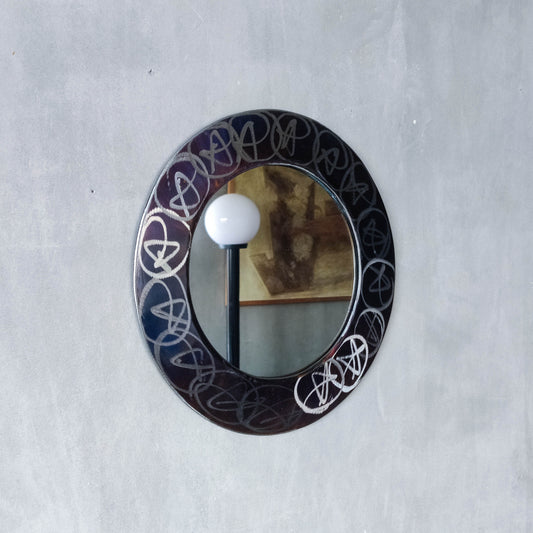 Vintage 1990s artisan made metalwork round steel mirror