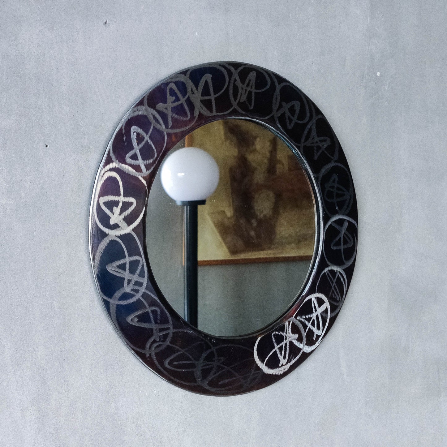 Vintage 1990s artisan made metalwork round steel mirror