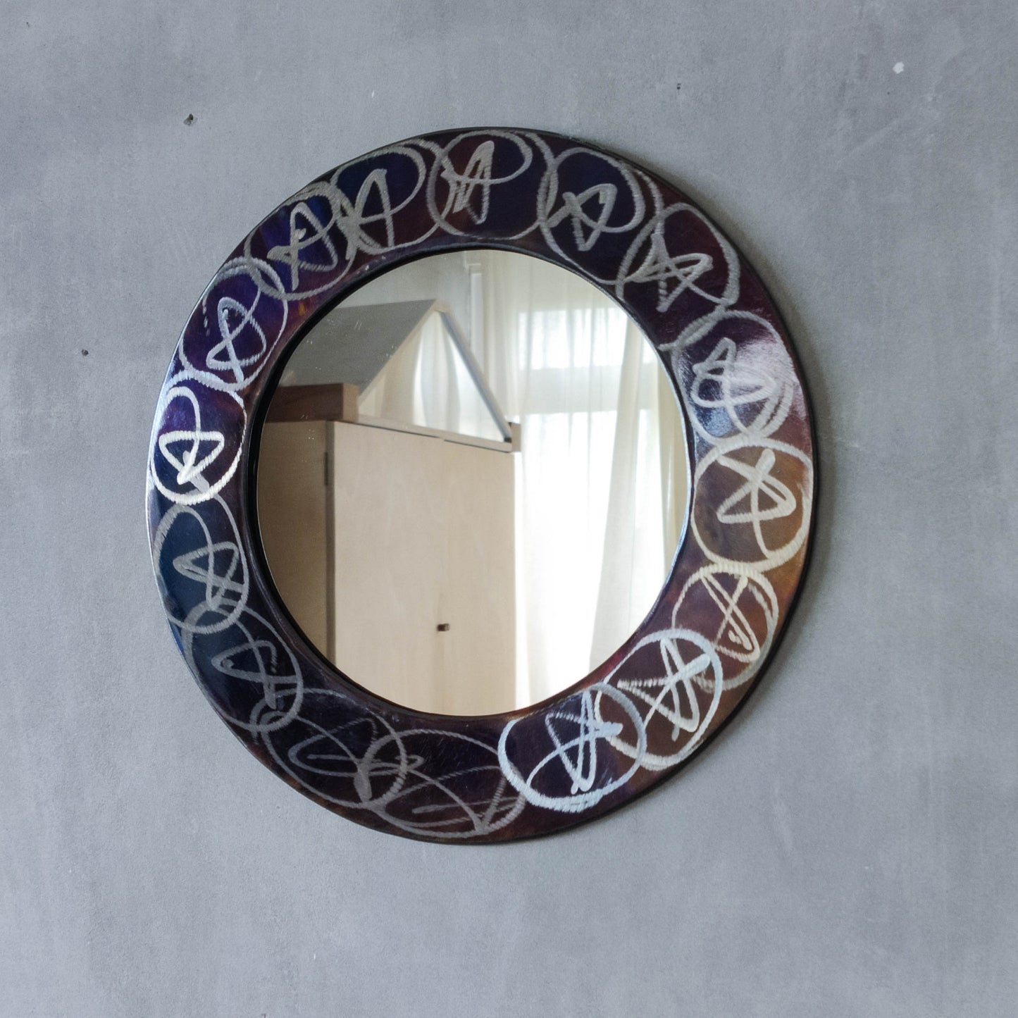 Vintage 1990s artisan made metalwork round steel mirror