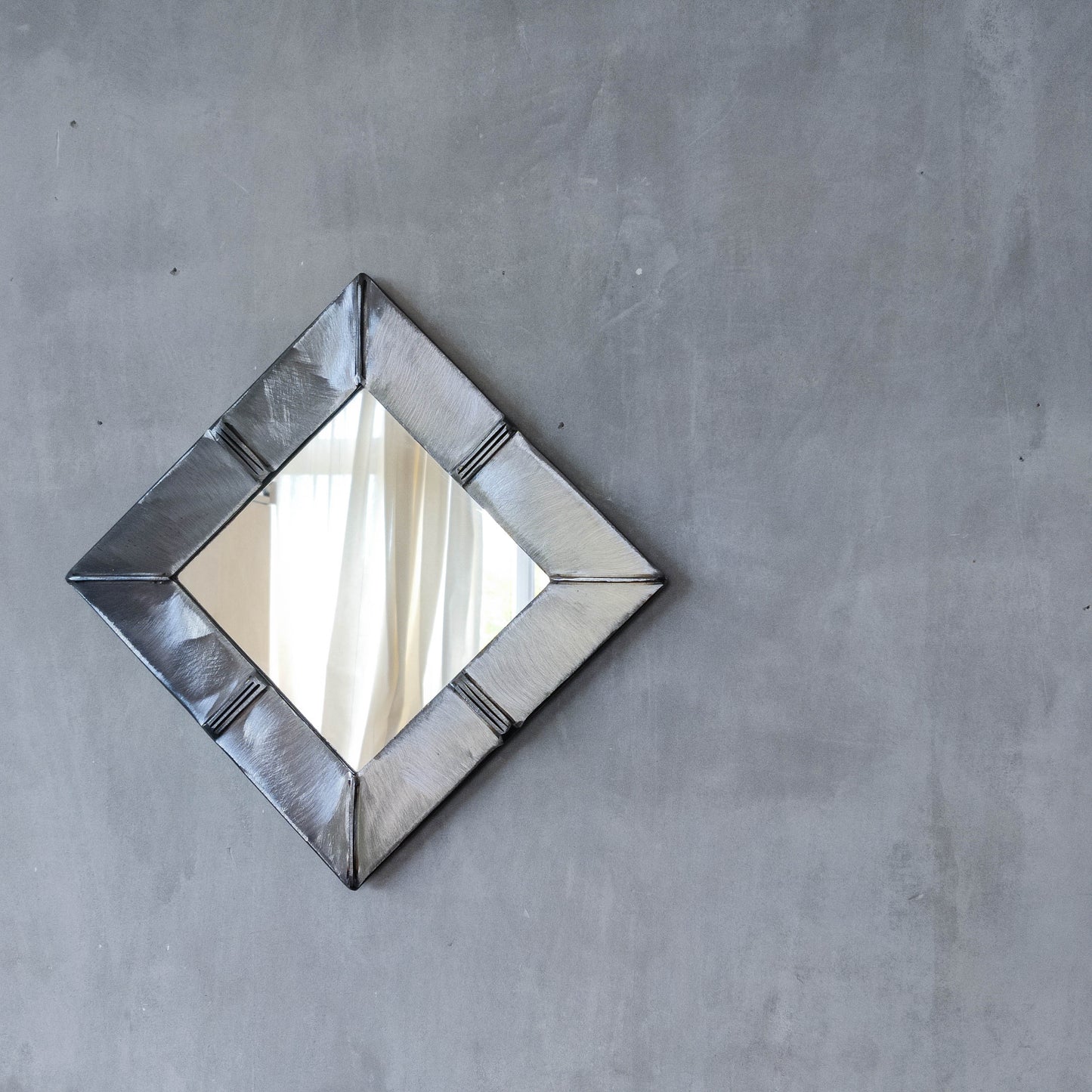 Vintage artisan made 1990s brushed welded mild steel geometric mirror