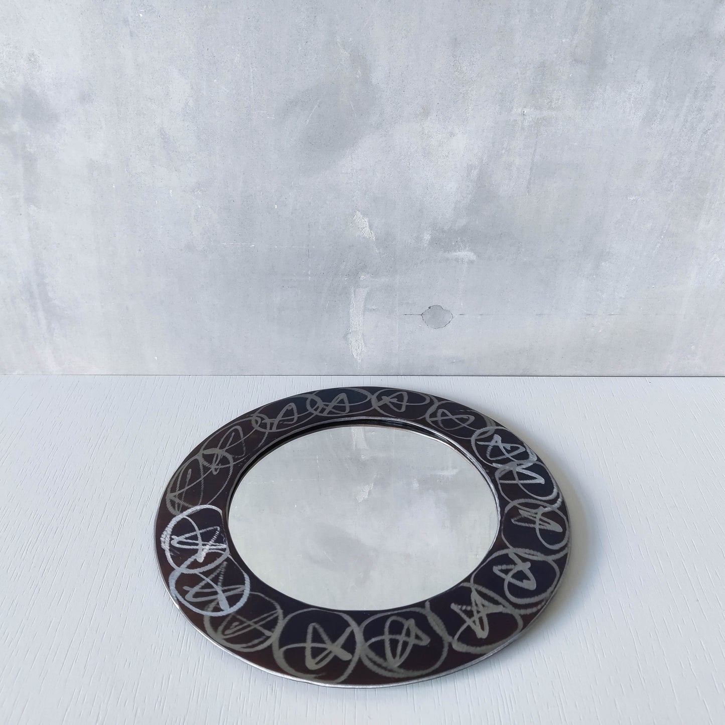 Vintage 1990s artisan made metalwork round steel mirror