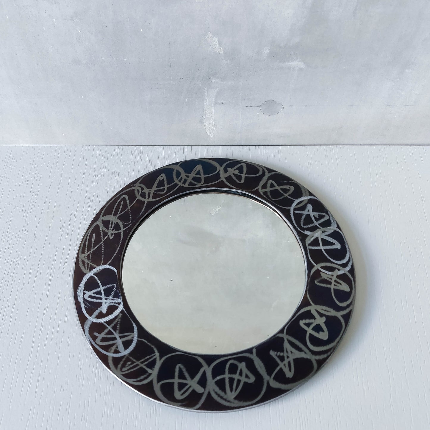 Vintage 1990s artisan made metalwork round steel mirror