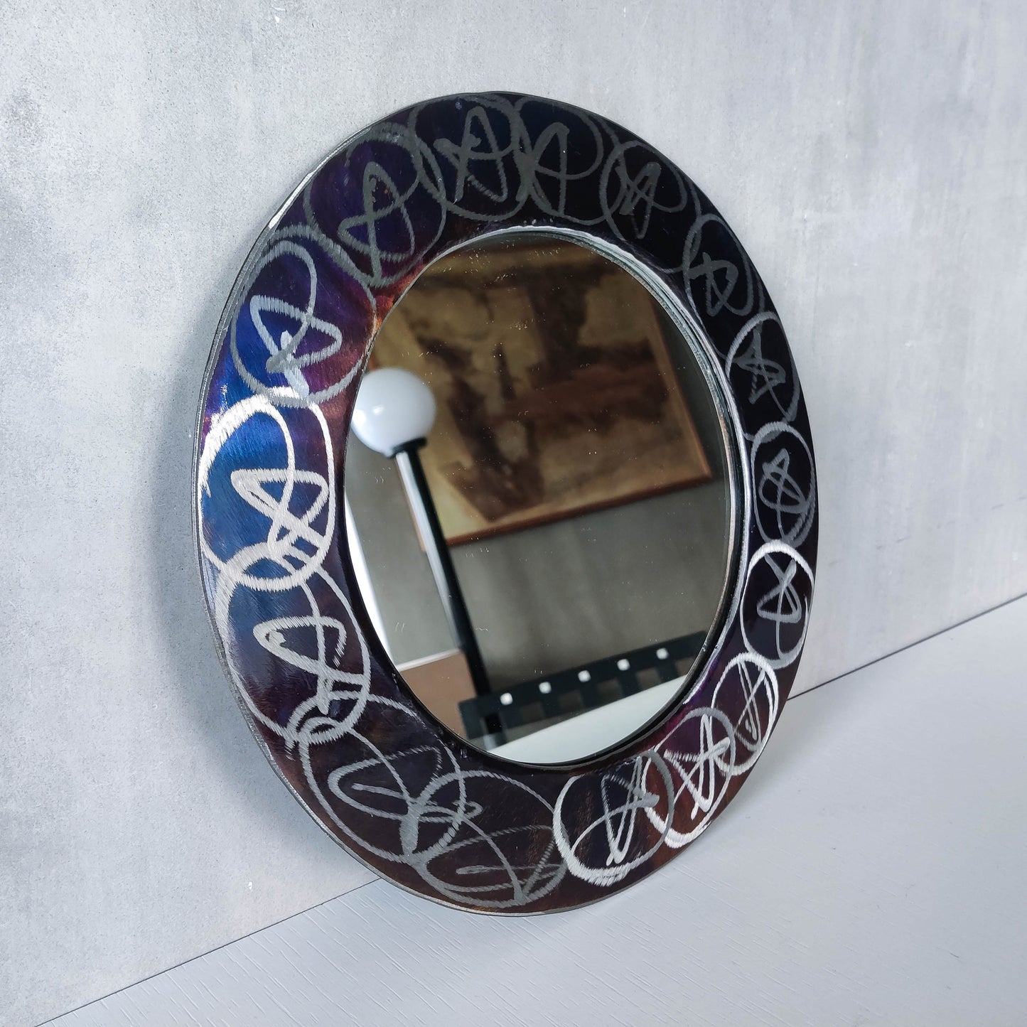 Vintage 1990s artisan made metalwork round steel mirror