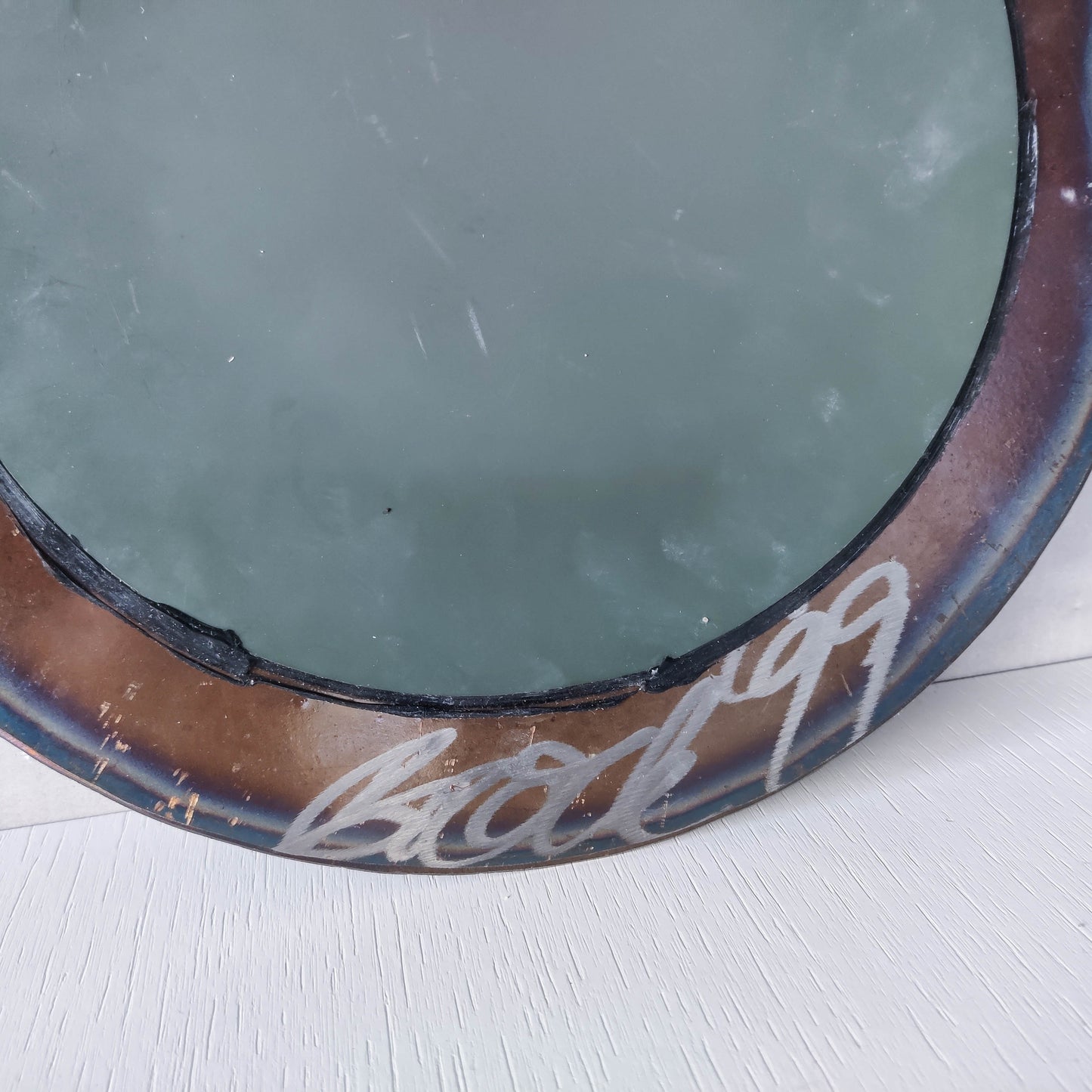 Vintage 1990s artisan made metalwork round steel mirror