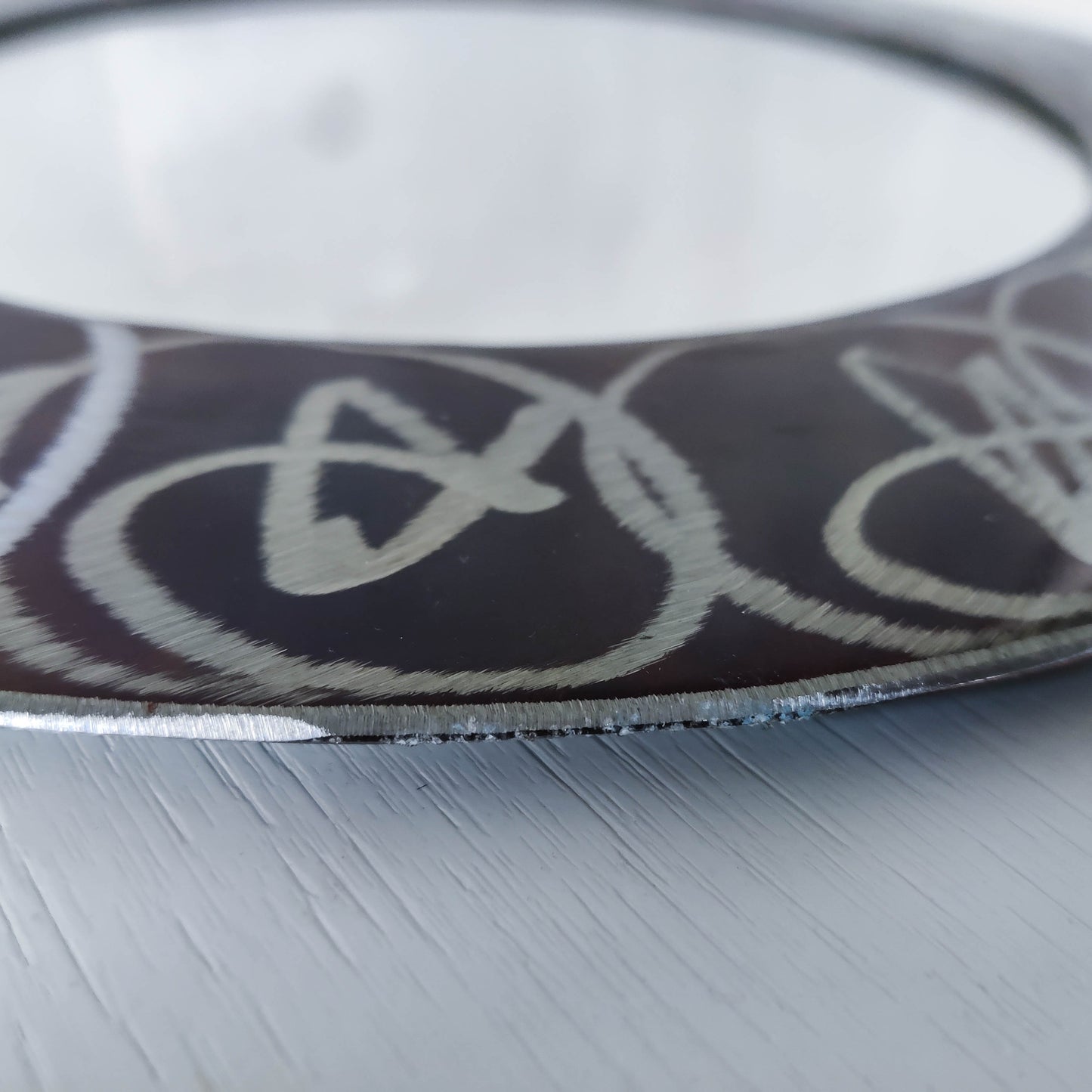 Vintage 1990s artisan made metalwork round steel mirror