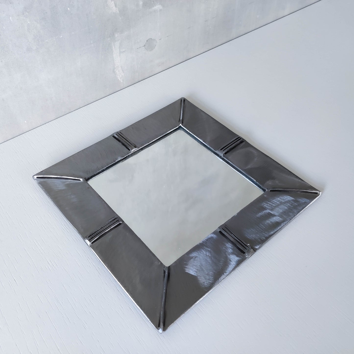 Vintage artisan made 1990s brushed welded mild steel geometric mirror