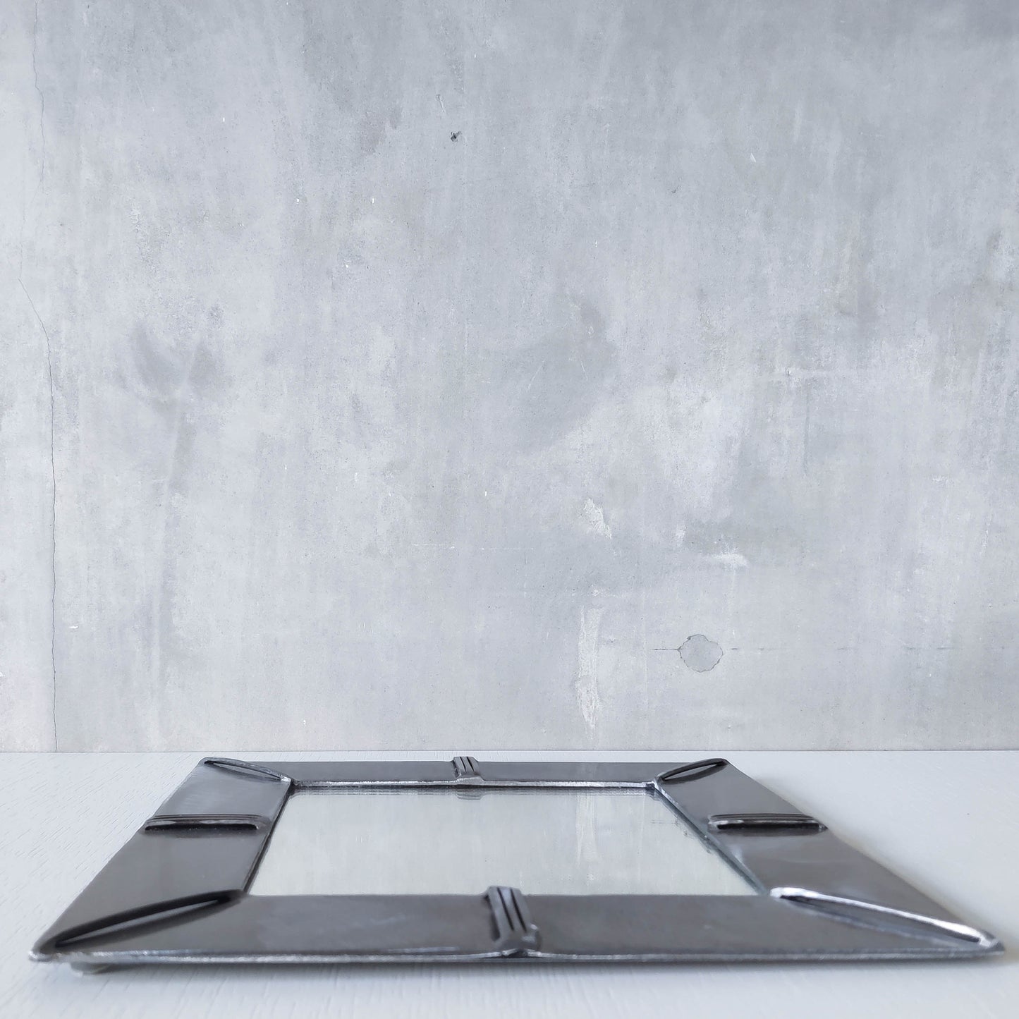 Vintage artisan made 1990s brushed welded mild steel geometric mirror