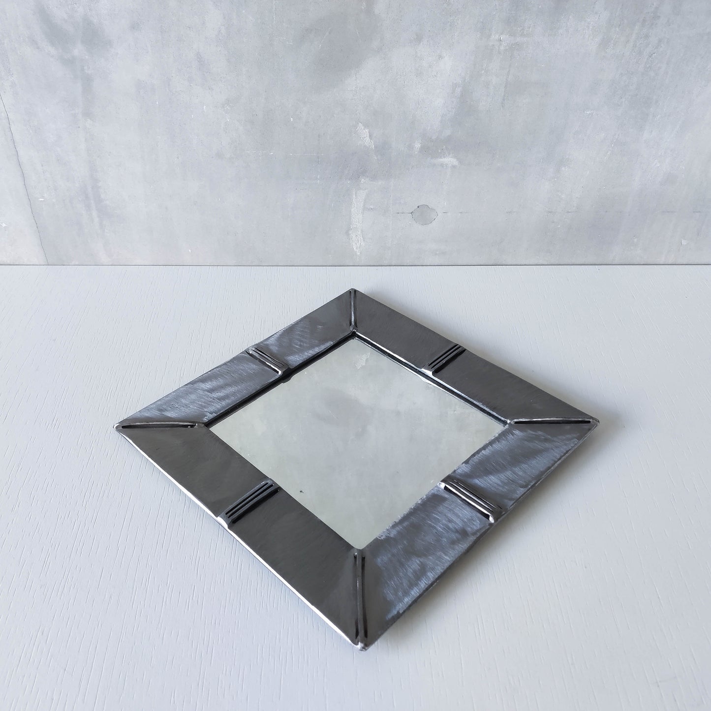 Vintage artisan made 1990s brushed welded mild steel geometric mirror