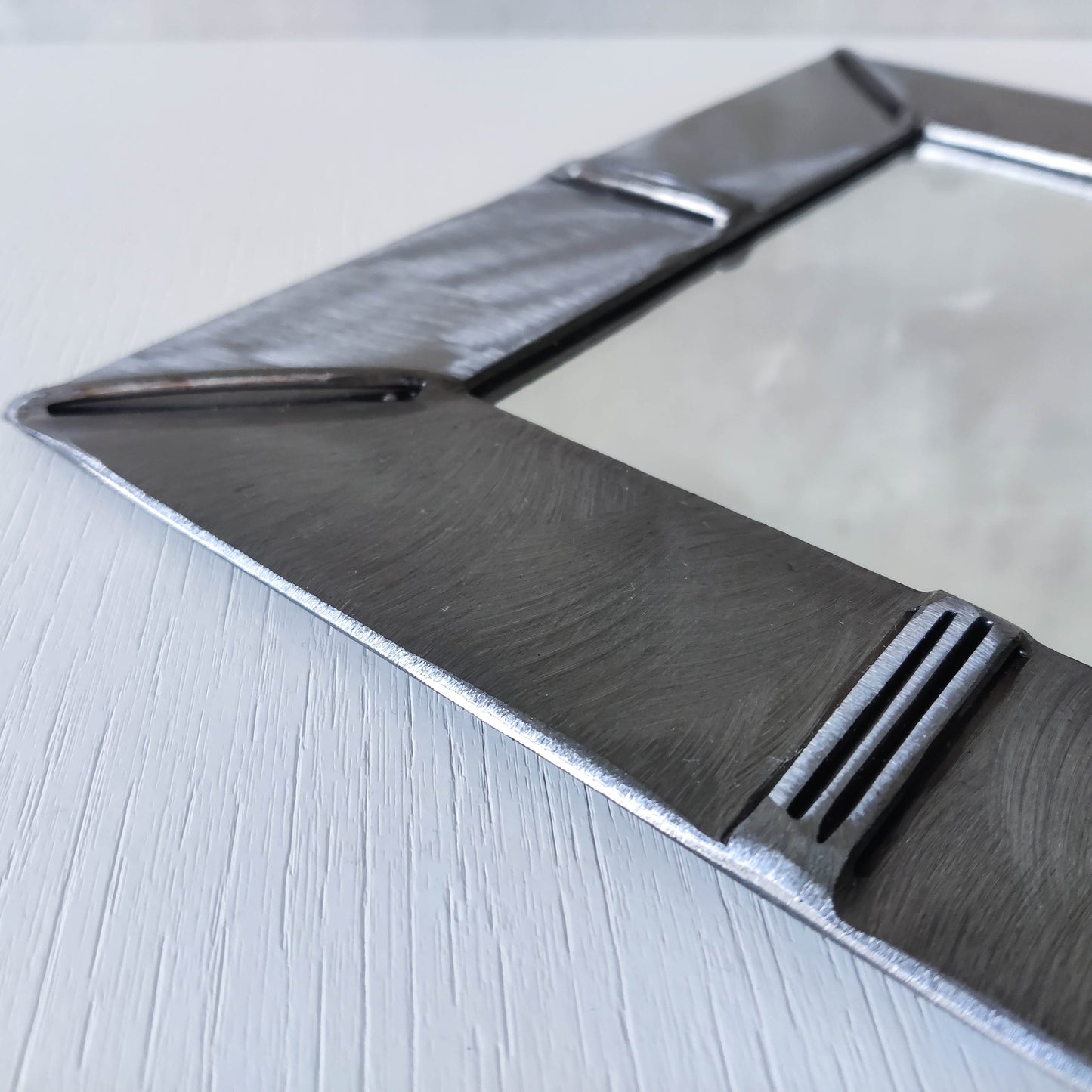 Vintage artisan made 1990s brushed welded mild steel geometric mirror