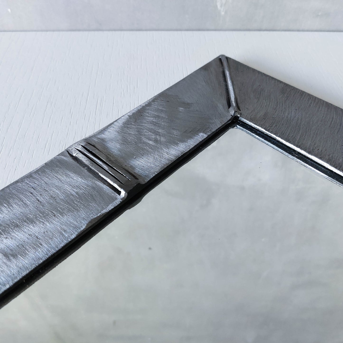 Vintage artisan made 1990s brushed welded mild steel geometric mirror