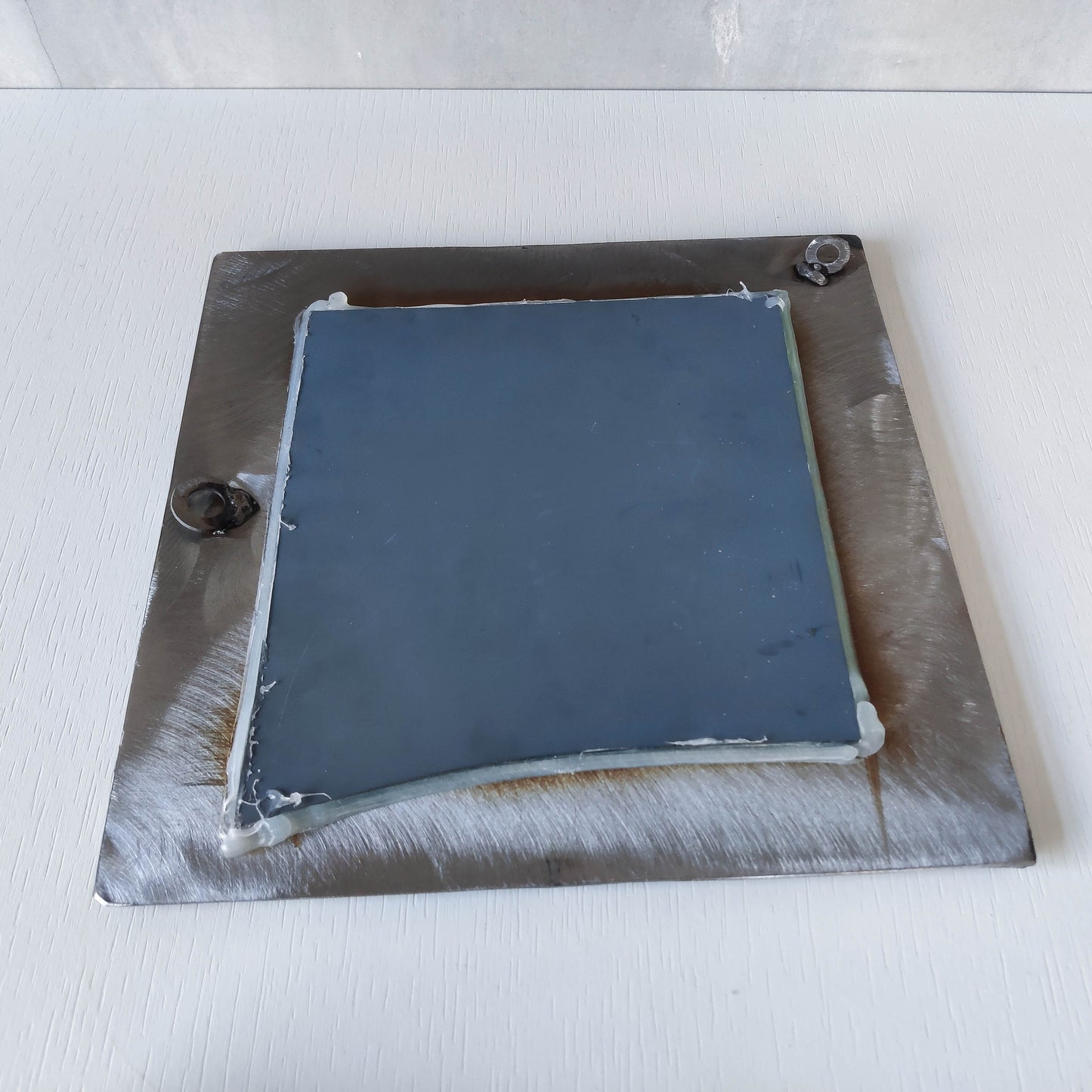 Vintage artisan made 1990s brushed welded mild steel geometric mirror