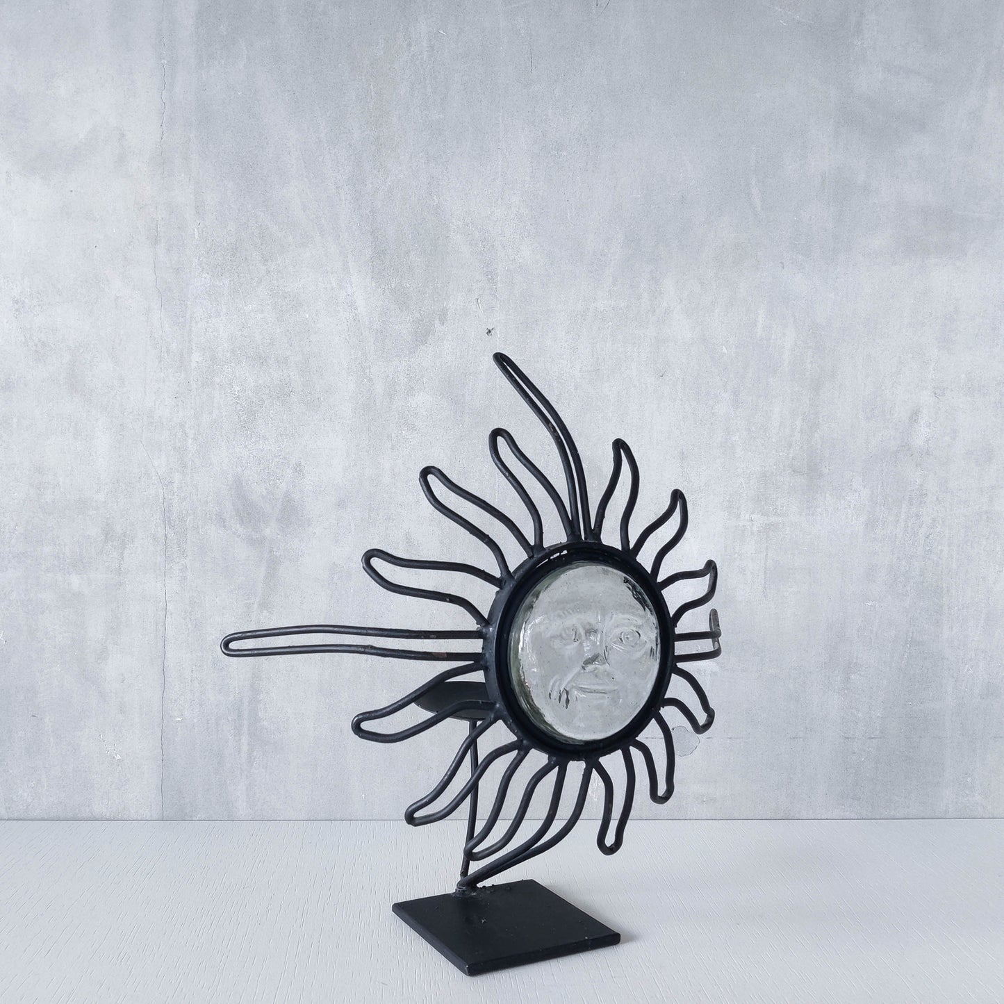 1990s celestial forged steel metal and cast glass sun face celestial candle holder