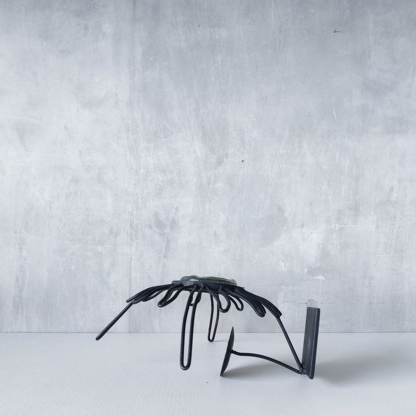 1990s celestial forged steel metal and cast glass sun face celestial candle holder