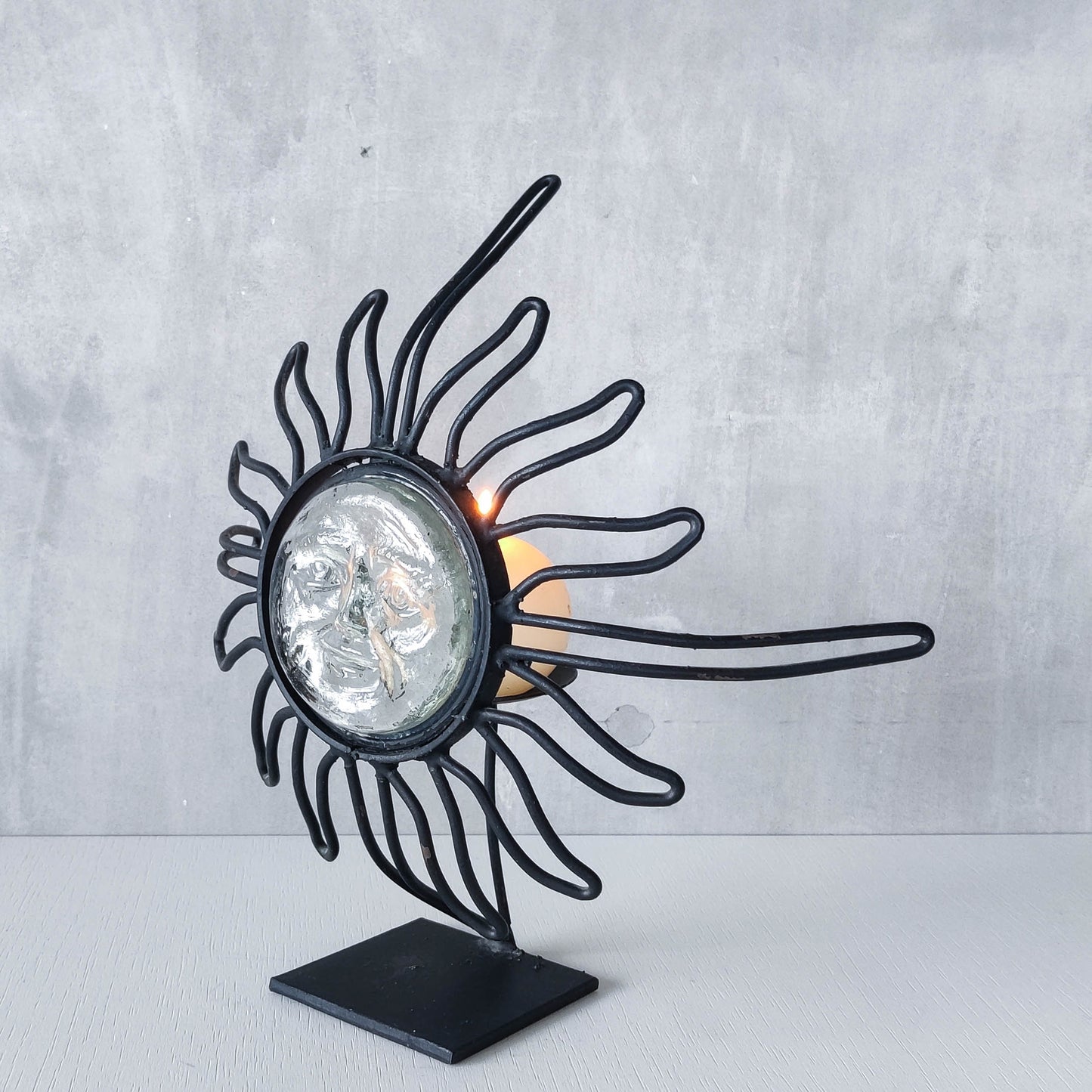 1990s celestial forged steel metal and cast glass sun face celestial candle holder