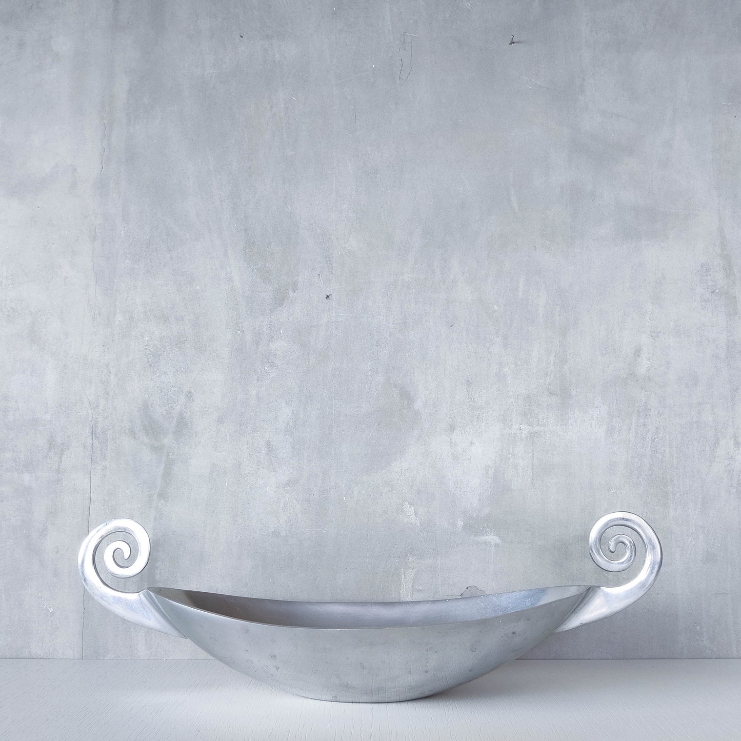 Vintage 1990s large sculptural spiral scroll boat shaped cast aluminium centrepiece bowl