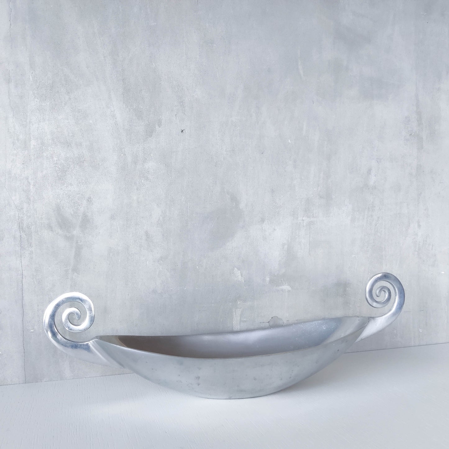 Vintage 1990s large sculptural spiral scroll boat shaped cast aluminium centrepiece bowl