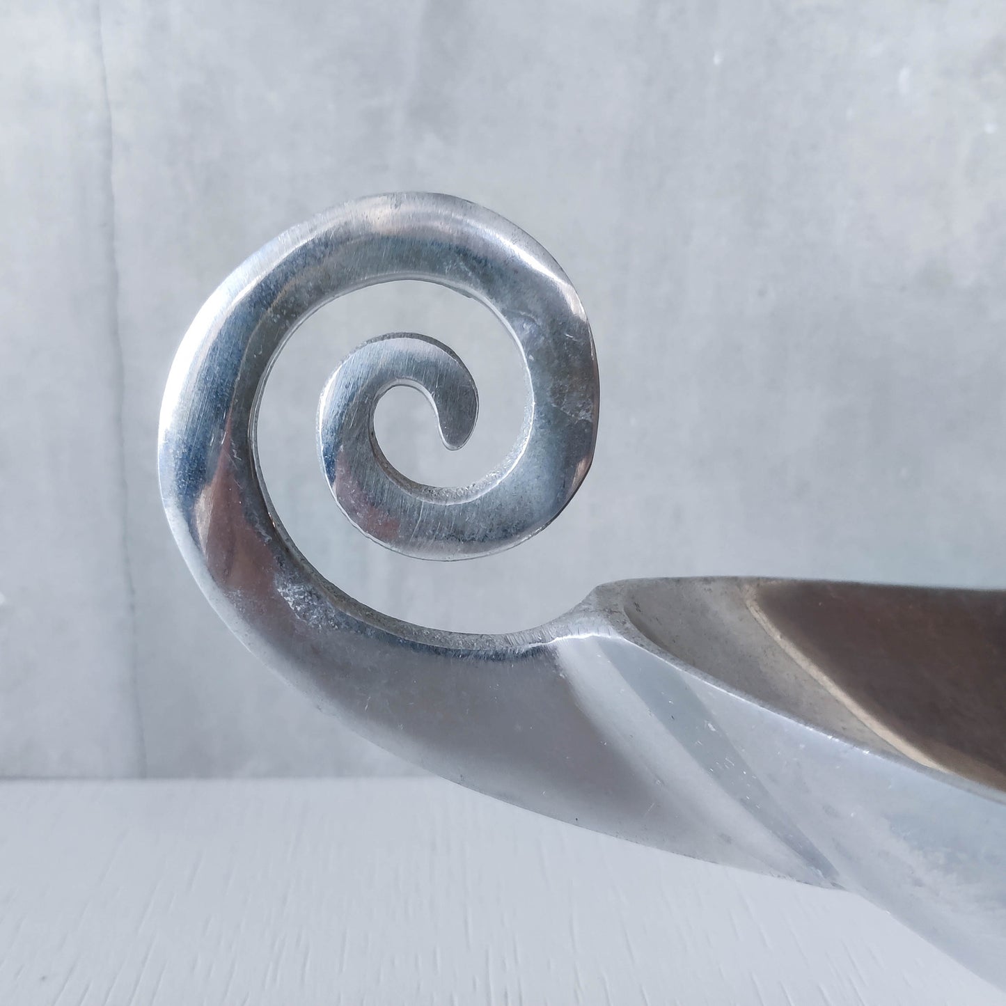 Vintage 1990s large sculptural spiral scroll boat shaped cast aluminium centrepiece bowl