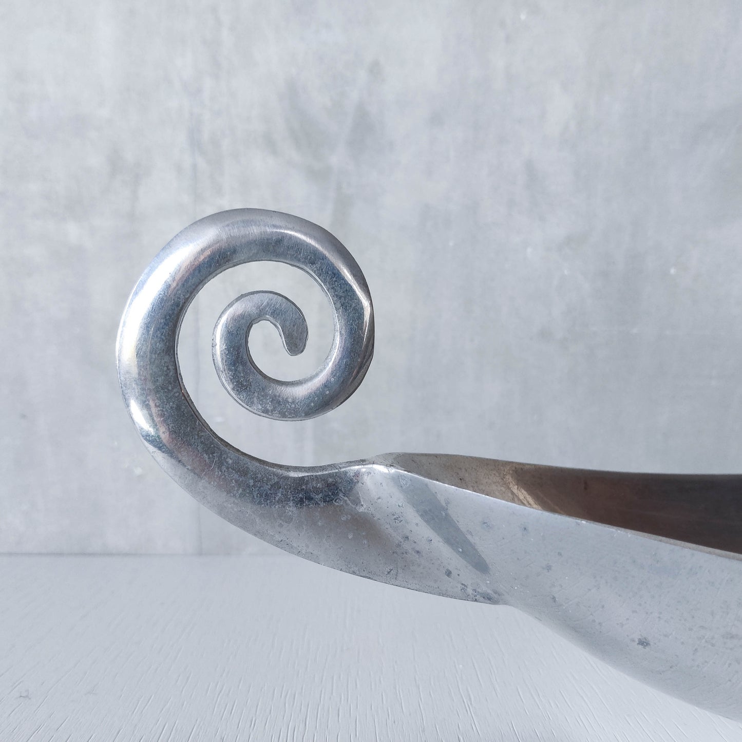 Vintage 1990s large sculptural spiral scroll boat shaped cast aluminium centrepiece bowl