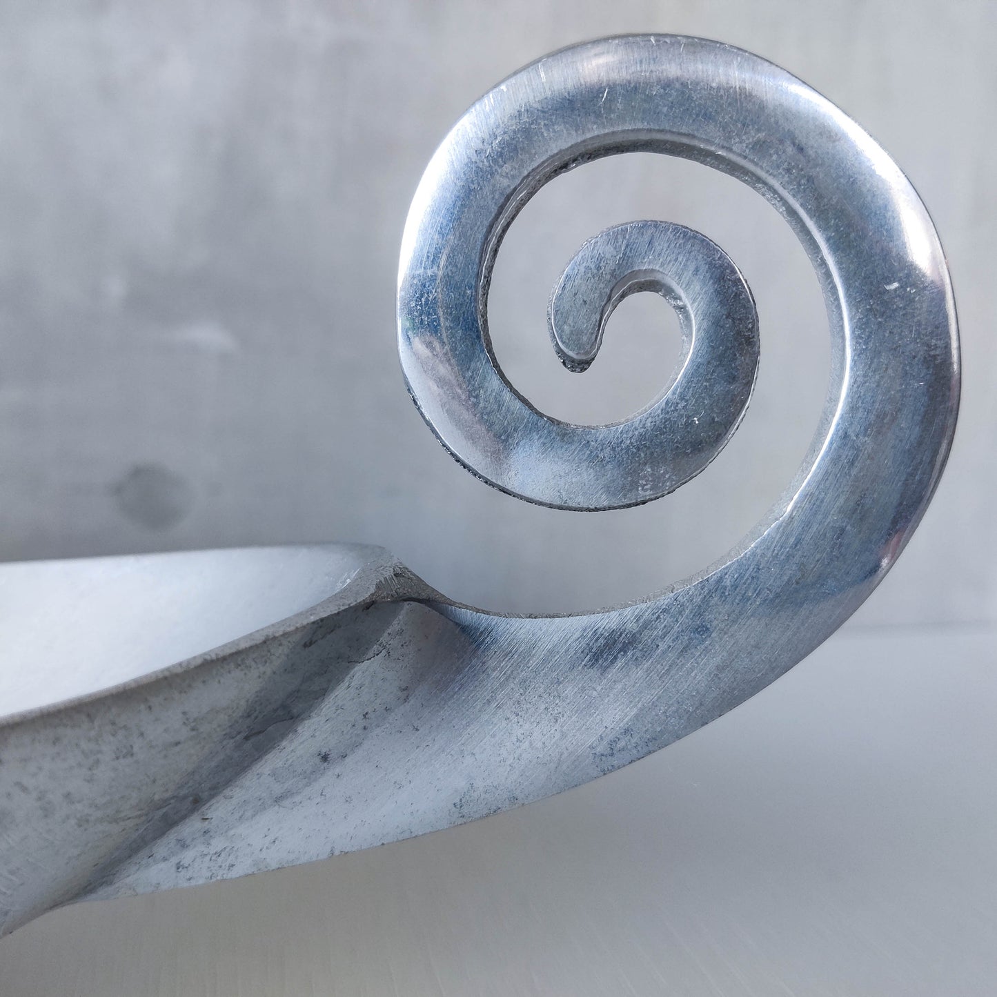 Vintage 1990s large sculptural spiral scroll boat shaped cast aluminium centrepiece bowl