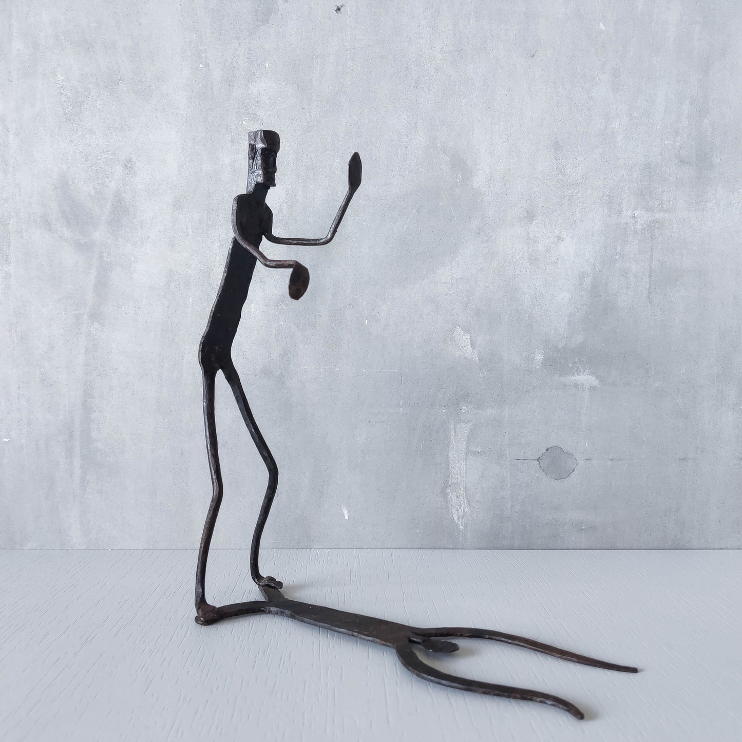 Brutalist wrought iron handmade figure with shadow sculpture or single bookend