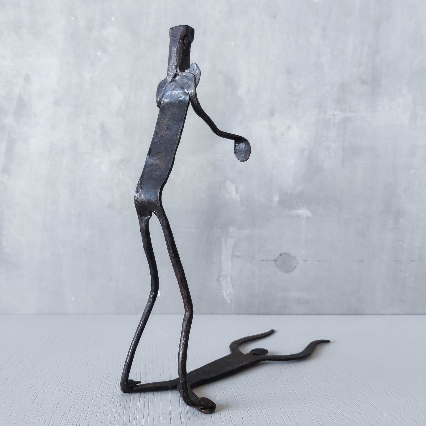 Brutalist wrought iron handmade figure with shadow sculpture or single bookend