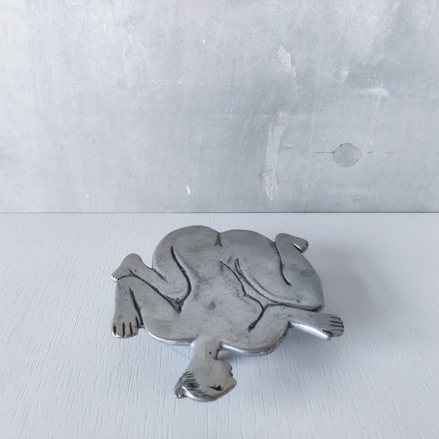 Vintage Carrol Boyes cast pewter whimsical figure nude trivet stand