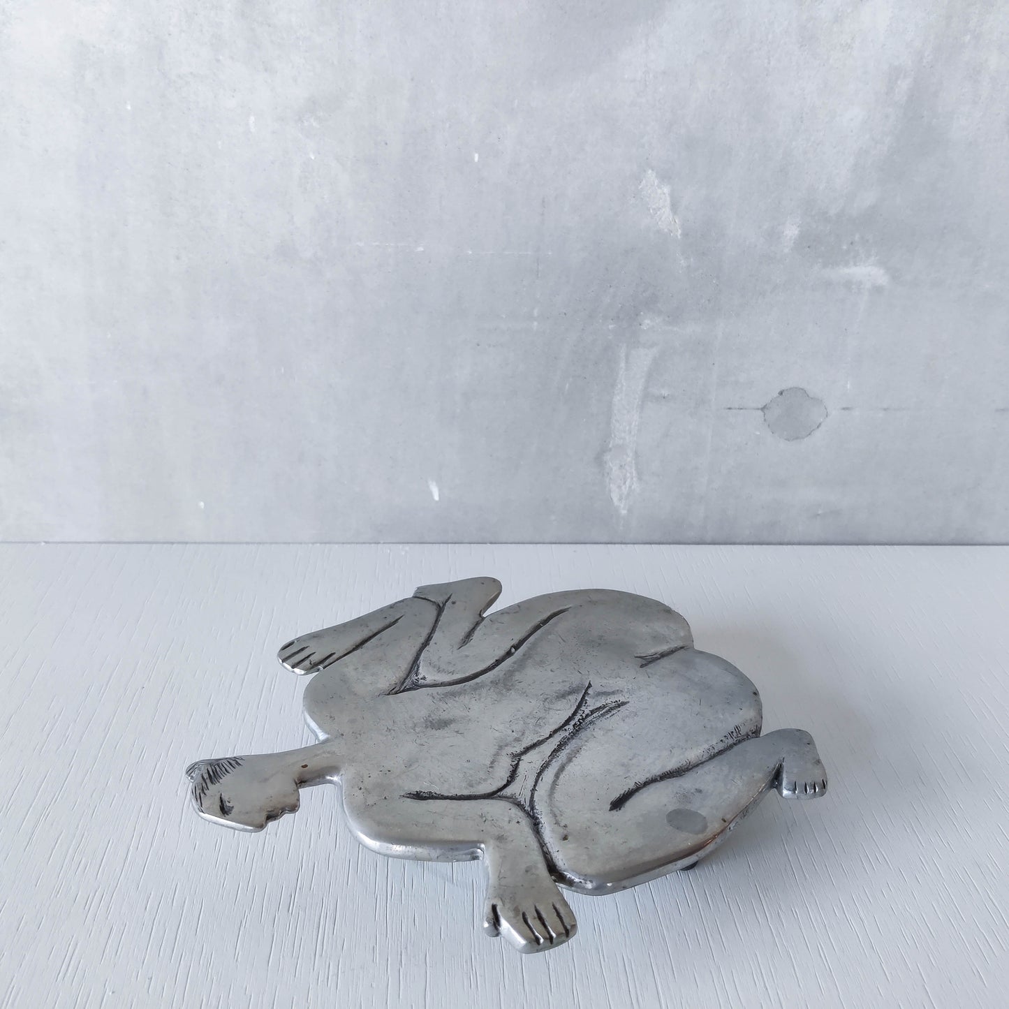 Vintage Carrol Boyes cast pewter whimsical figure nude trivet stand