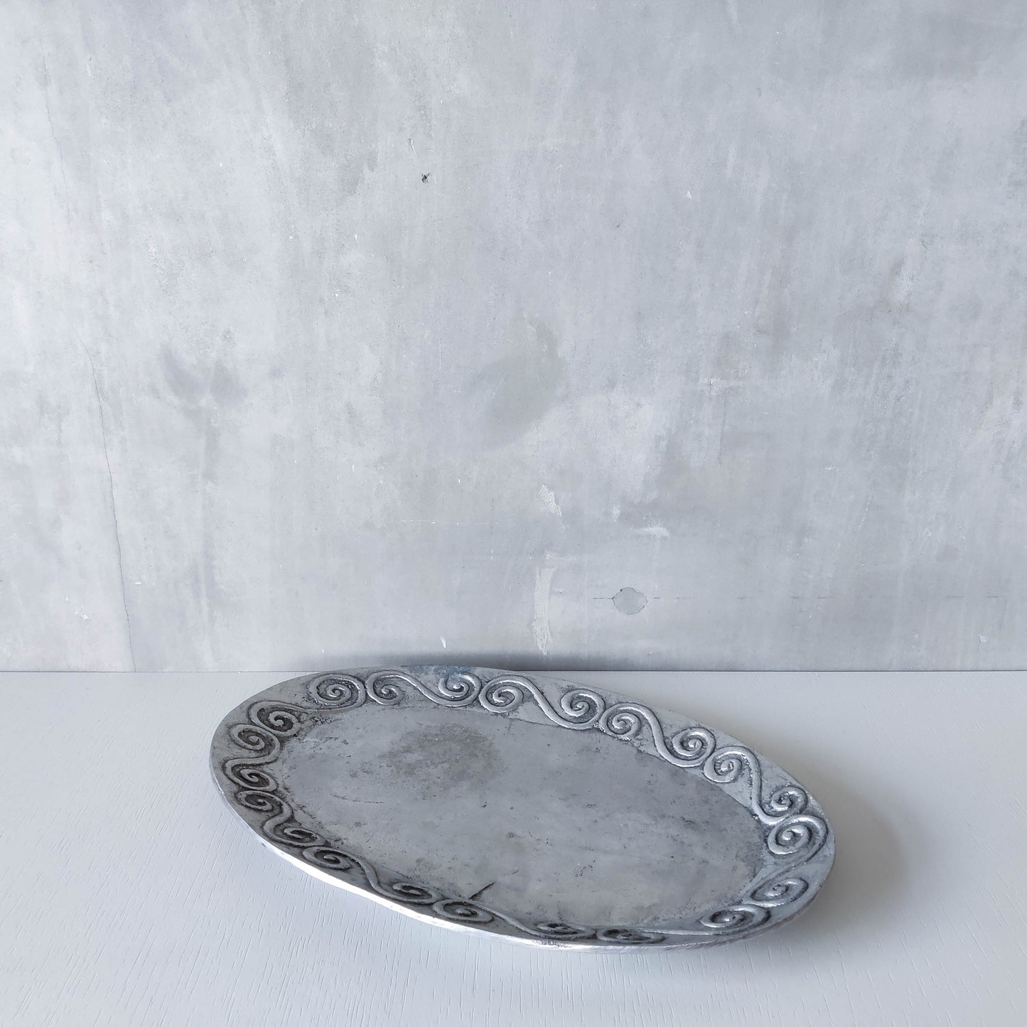 1990s hand cast aluminium silver metal scroll spiral platter centrepiece