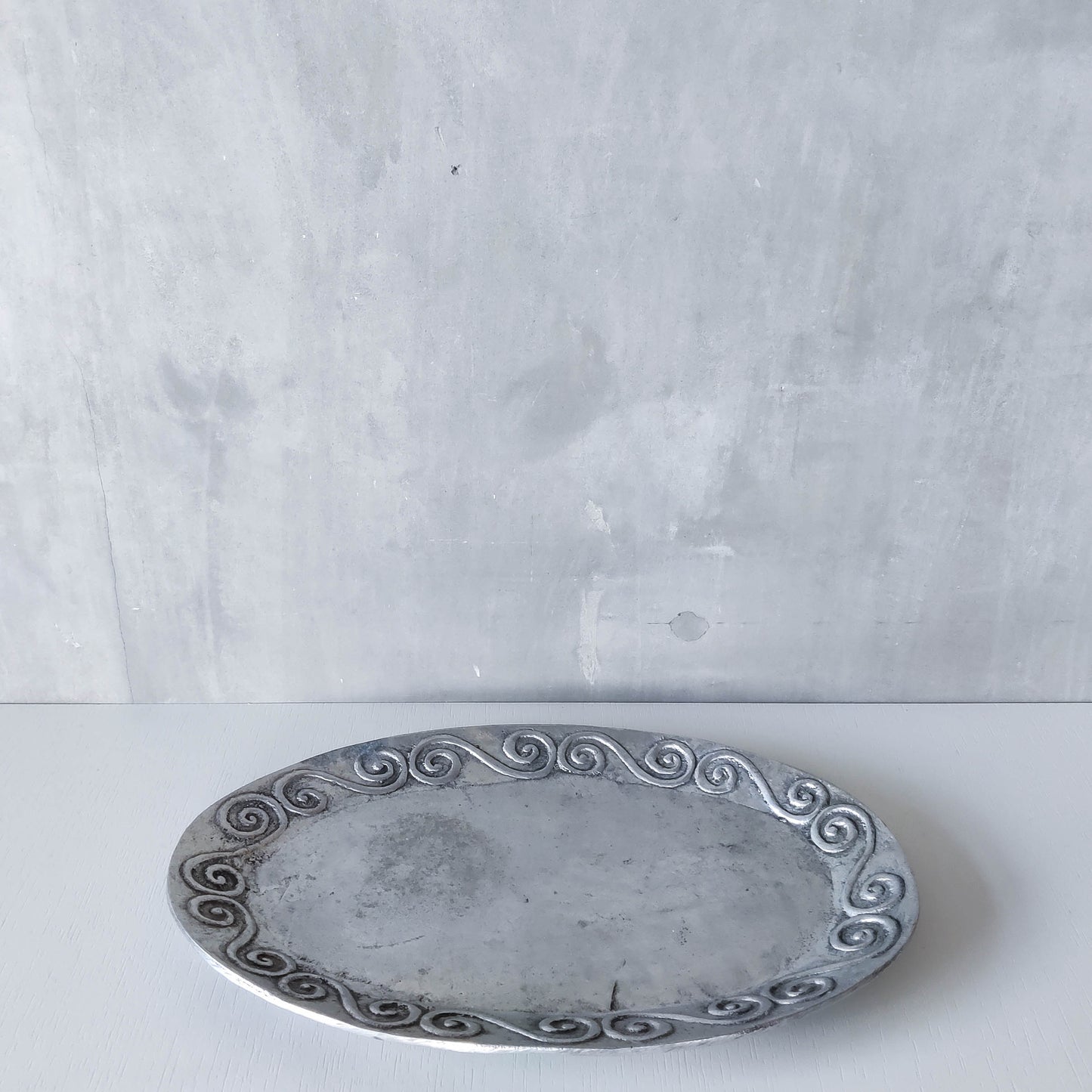 1990s hand cast aluminium silver metal scroll spiral platter centrepiece