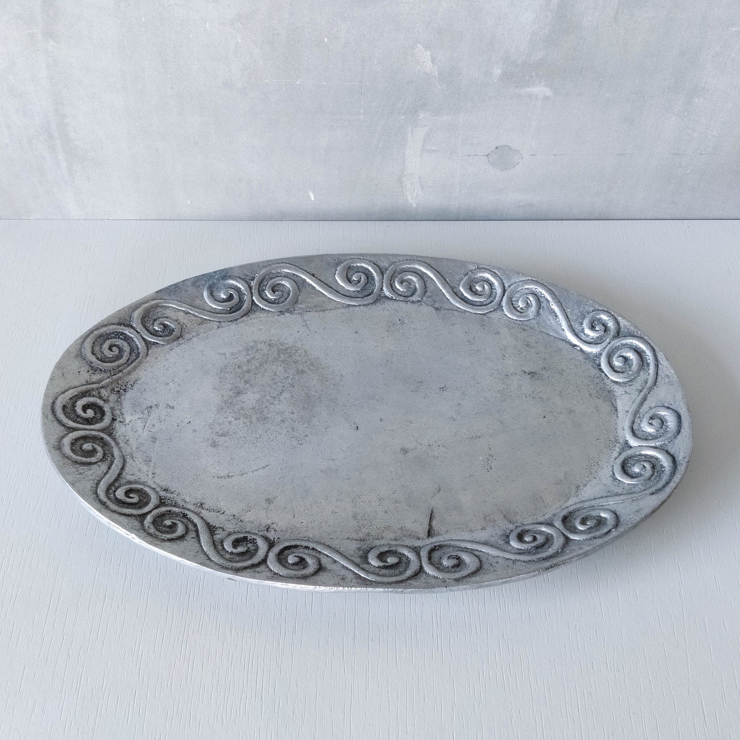 1990s hand cast aluminium silver metal scroll spiral platter centrepiece