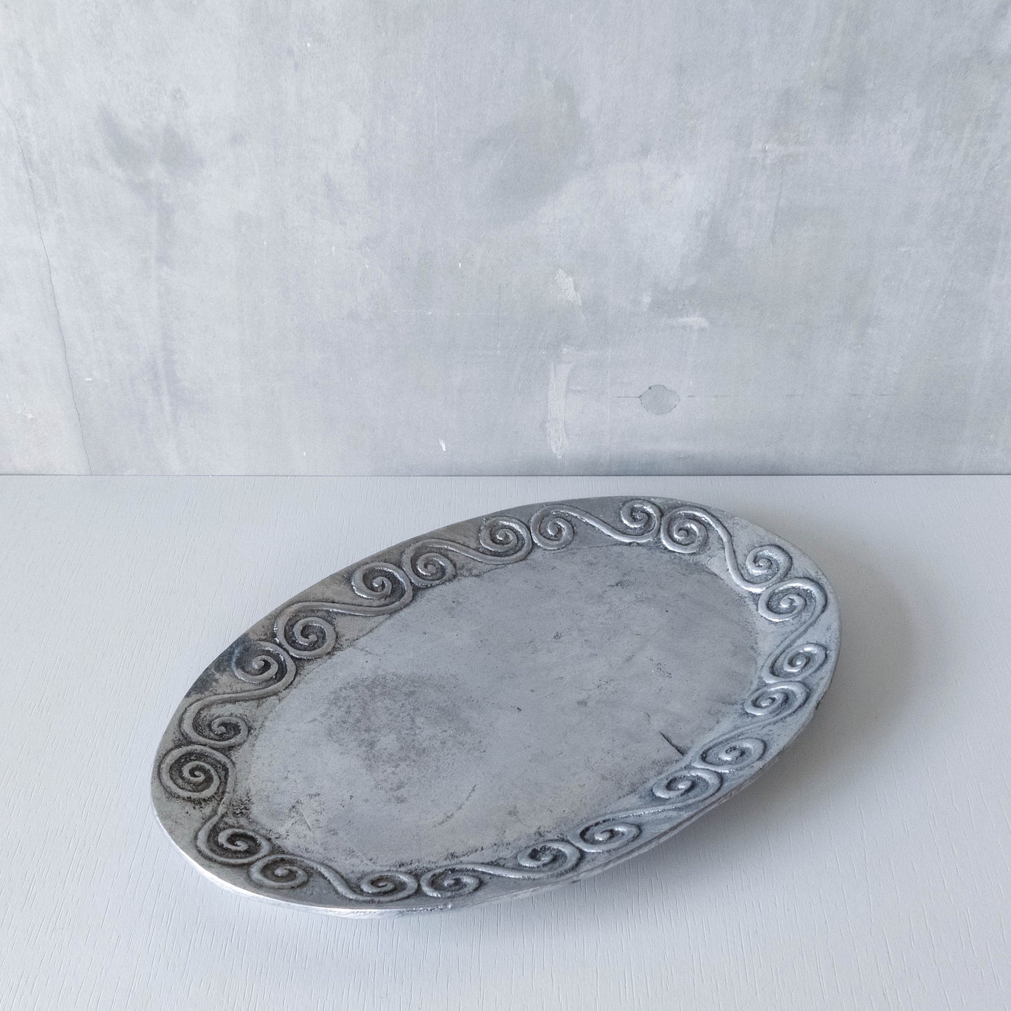 1990s hand cast aluminium silver metal scroll spiral platter centrepiece