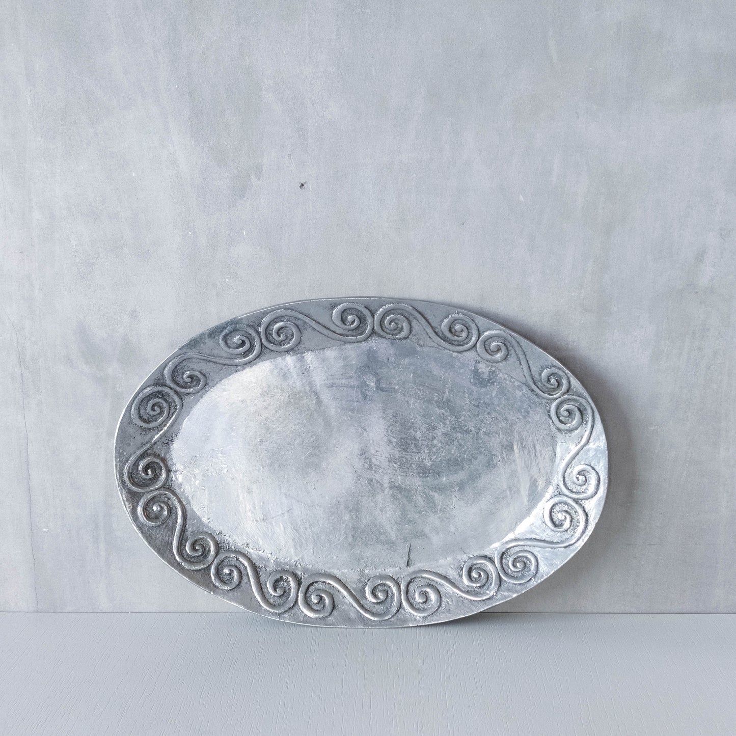 1990s hand cast aluminium silver metal scroll spiral platter centrepiece