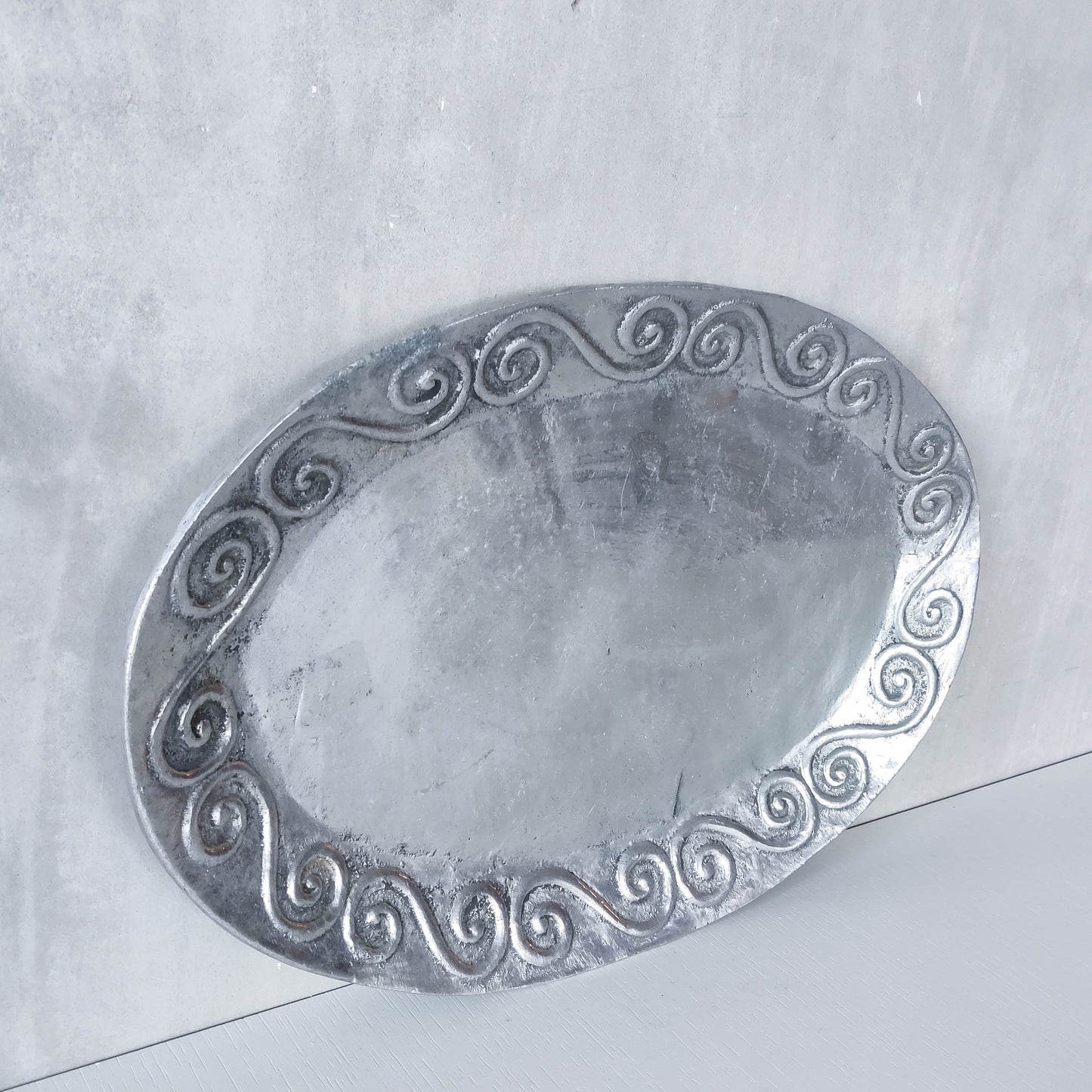1990s hand cast aluminium silver metal scroll spiral platter centrepiece