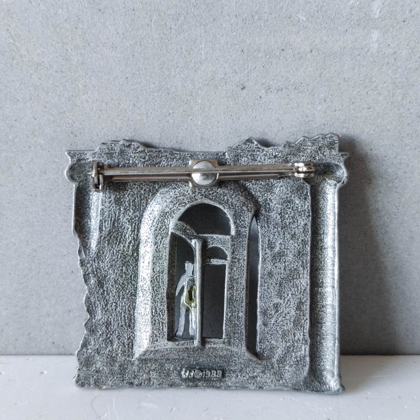 JJ Jonette vintage 1988 metaphysical style pewter figurative brooch