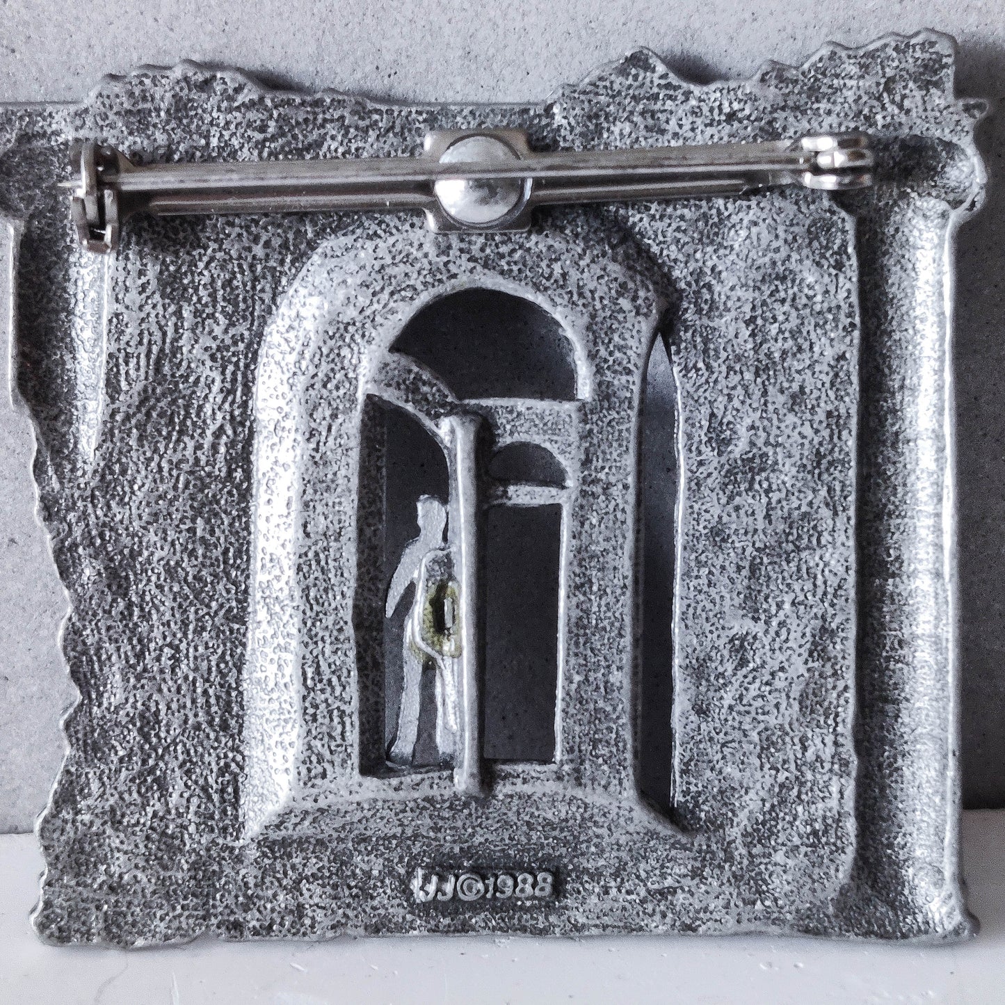 JJ Jonette vintage 1988 metaphysical style pewter figurative brooch