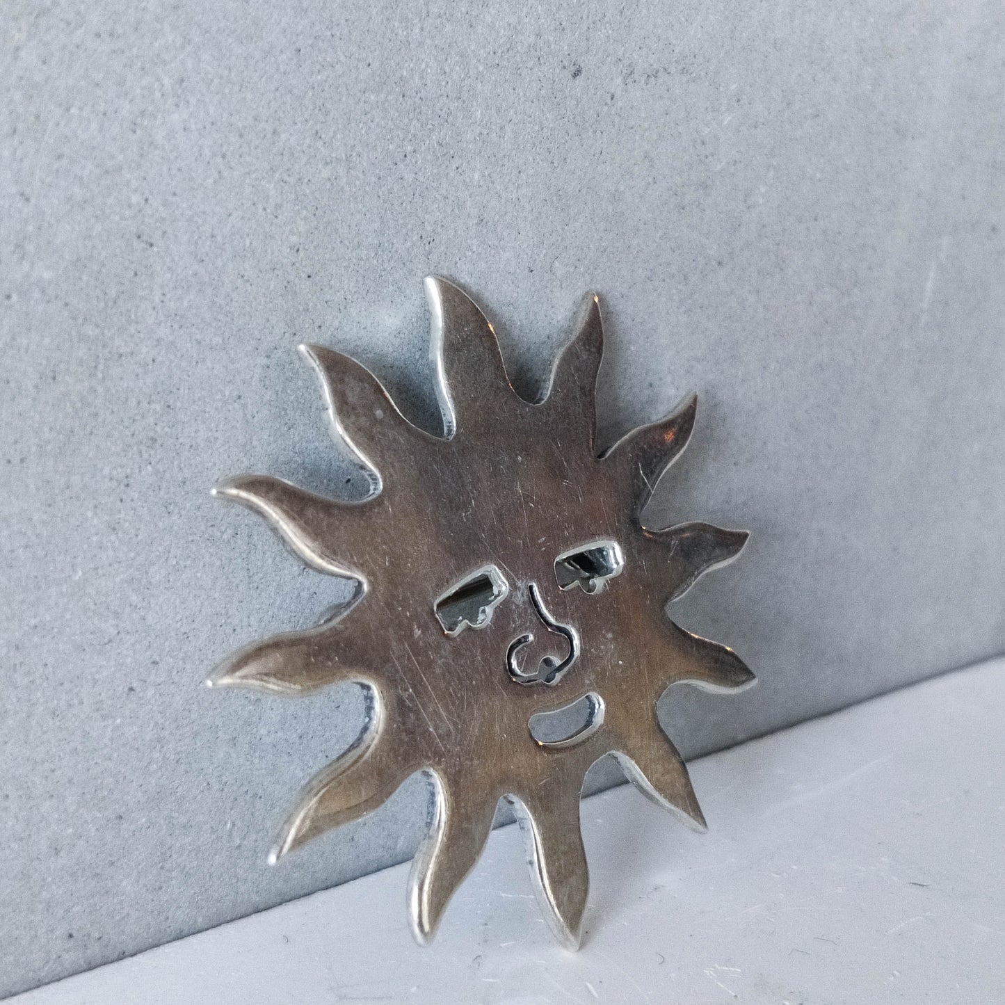 Vintage Taxco Mexico sterling silver sun face brooch