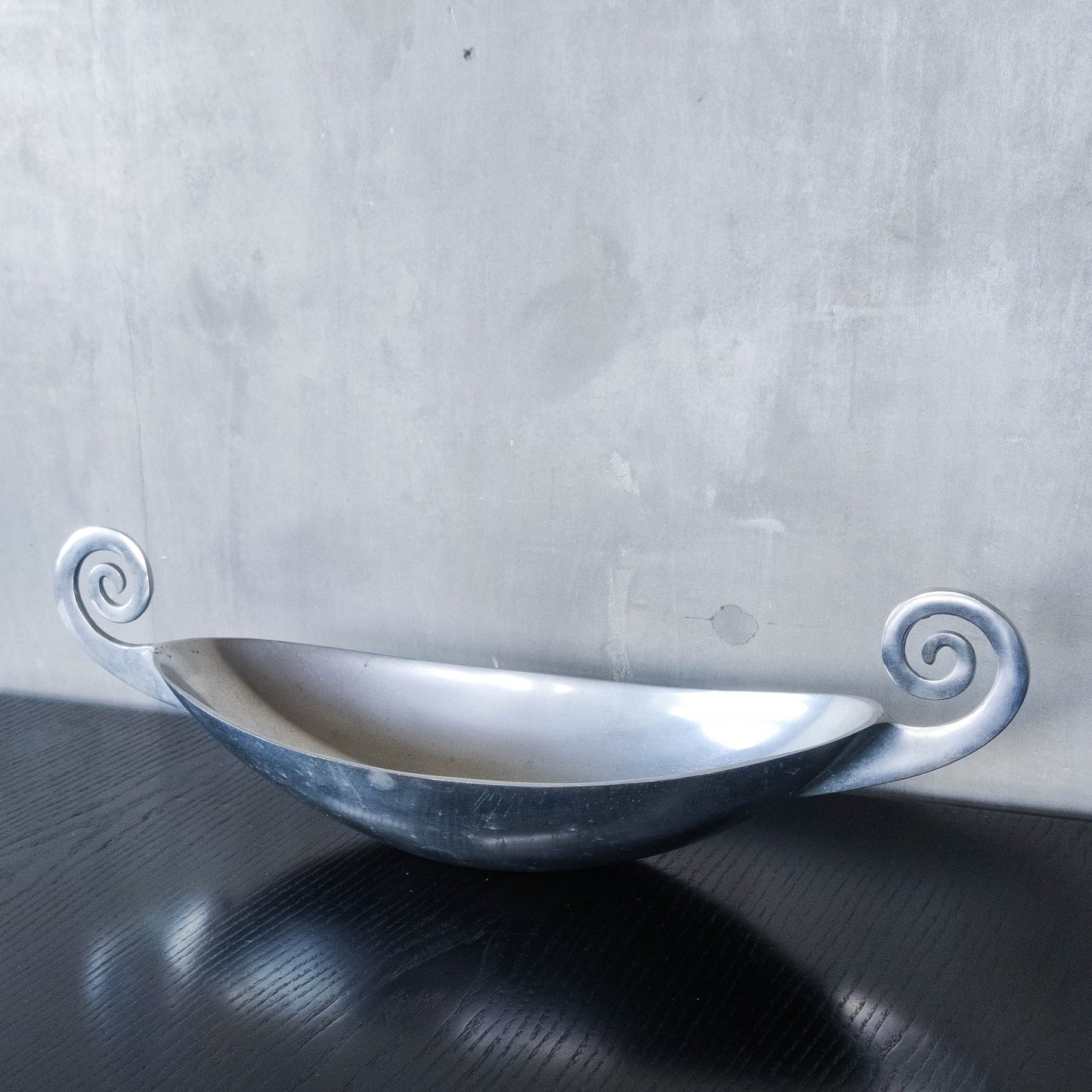 Vintage 1990s large sculptural spiral scroll boat shaped cast aluminium centrepiece bowl