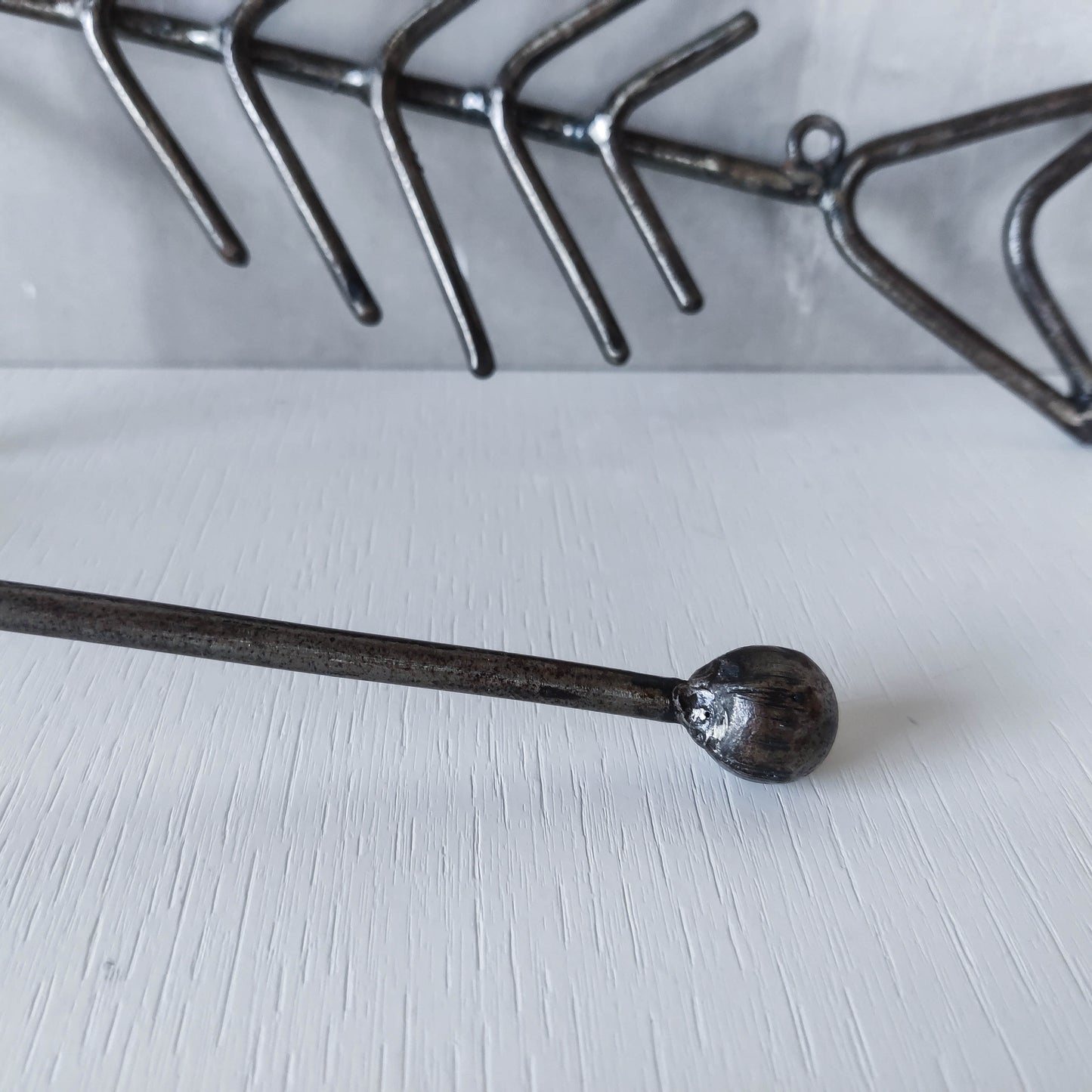 Vintage artisan made metalwork welded steel fish skeleton toilet roll holder