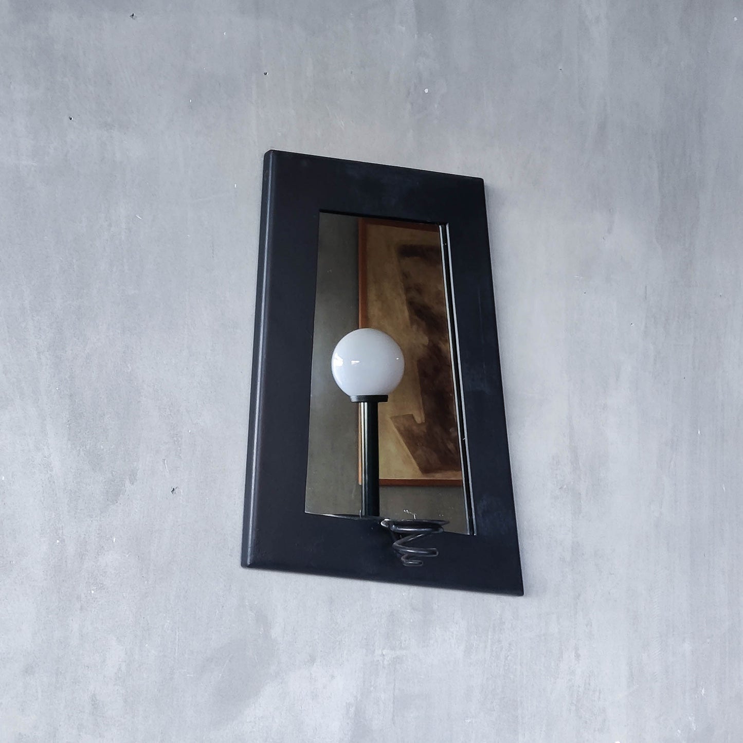 1990s handmade steel metalwork asymmetric mirror with candle sconce