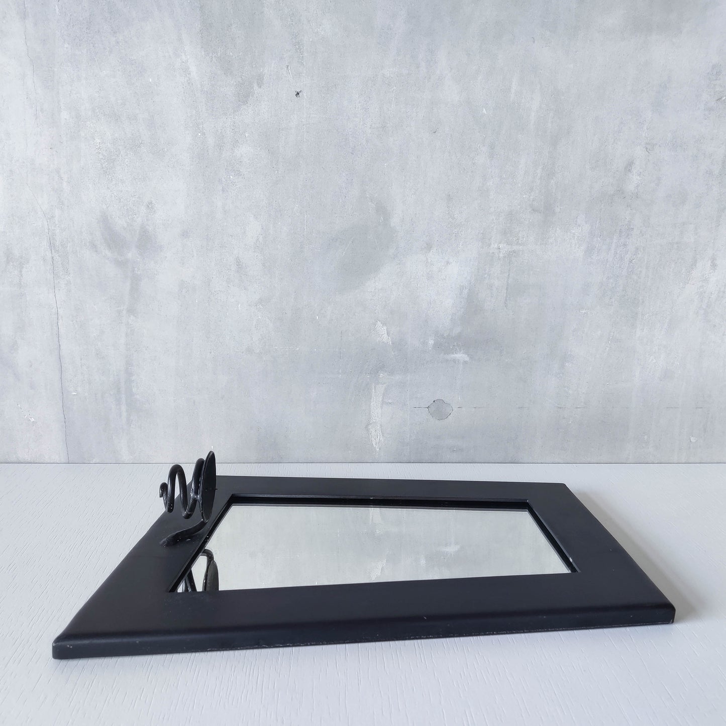 1990s handmade steel metalwork asymmetric mirror with candle sconce