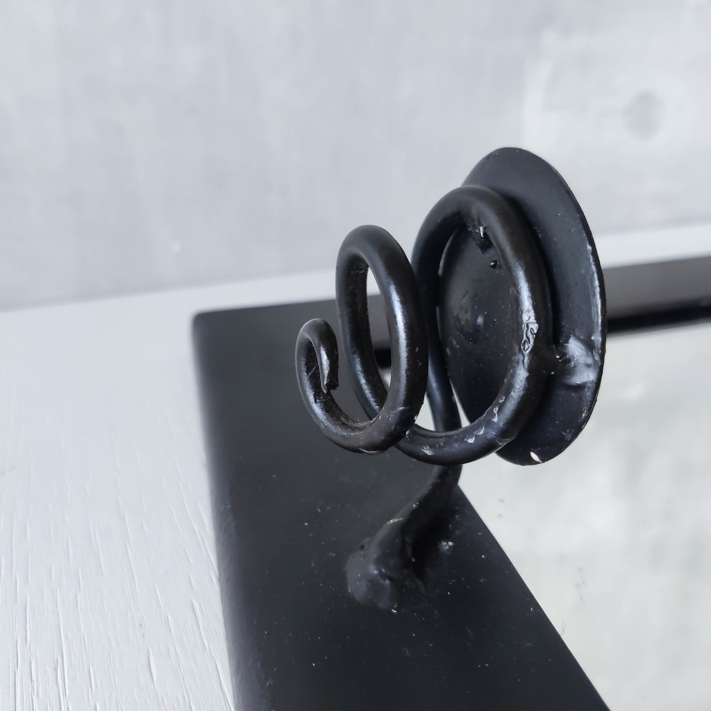 1990s handmade steel metalwork asymmetric mirror with candle sconce