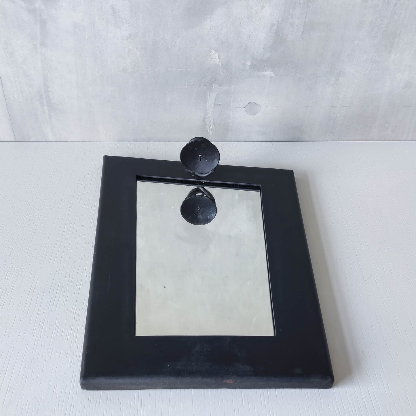 1990s handmade steel metalwork asymmetric mirror with candle sconce