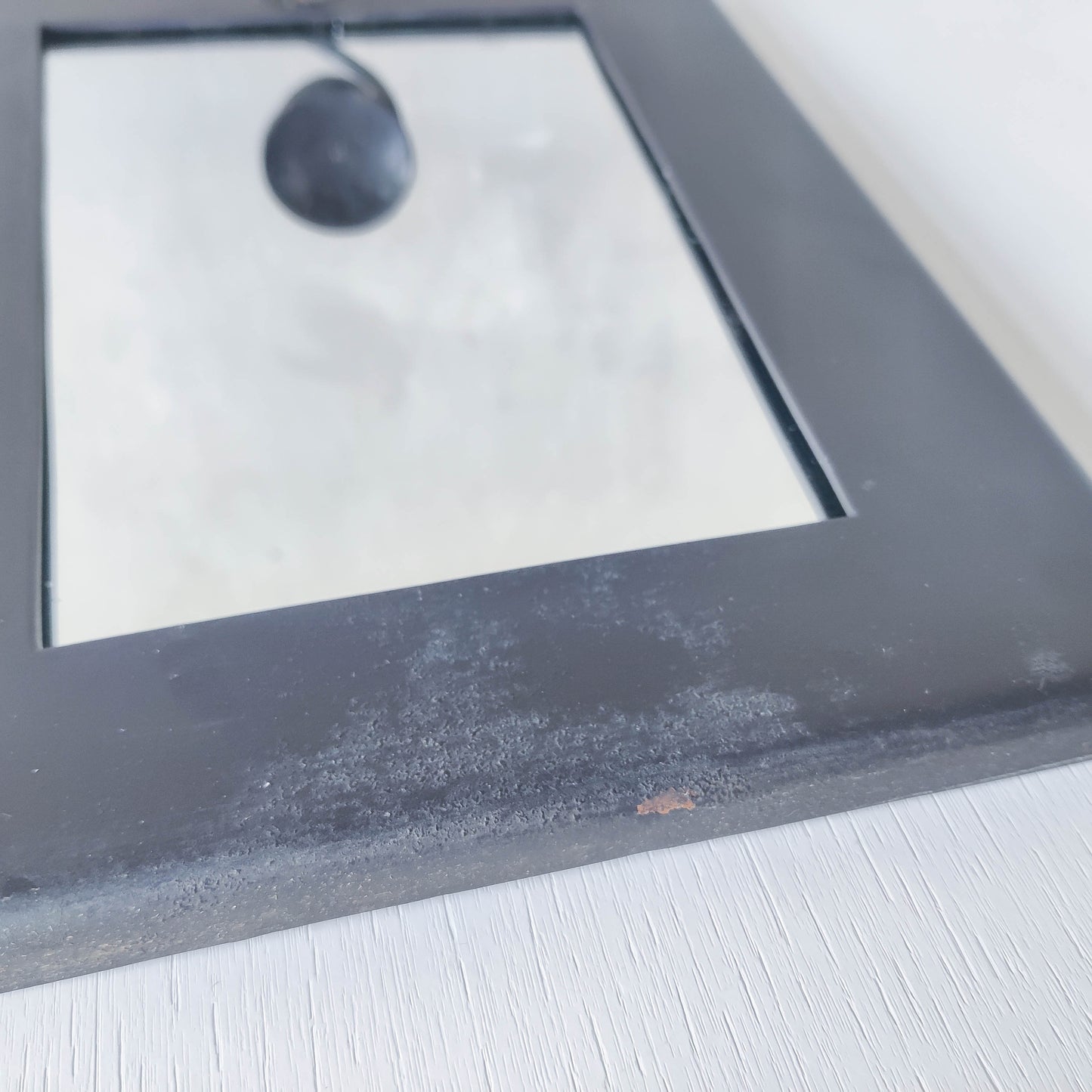 1990s handmade steel metalwork asymmetric mirror with candle sconce